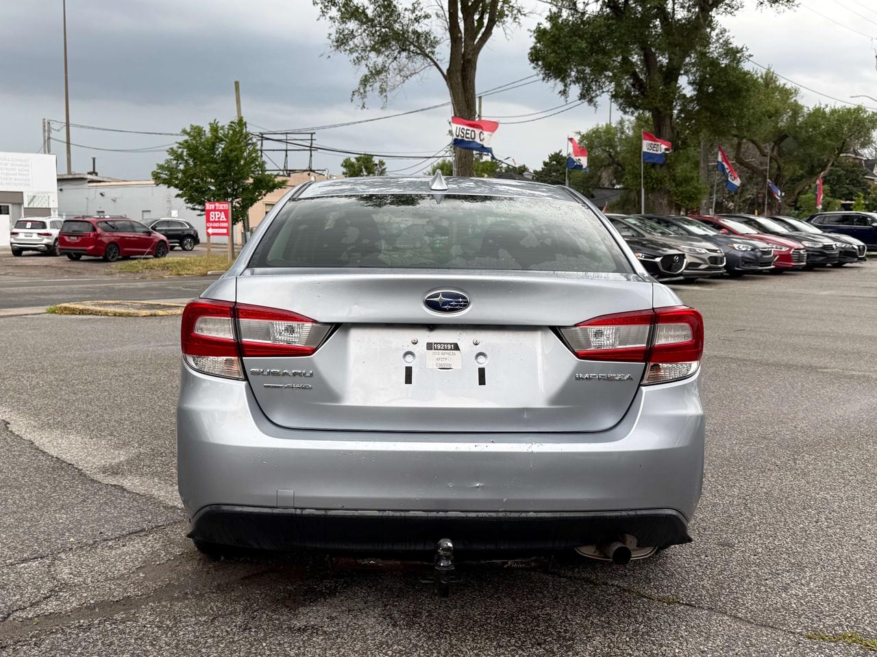 2019 Subaru Impreza Touring l AWD l 2.0 l 4Cyl l Auto l CarPlay Photo