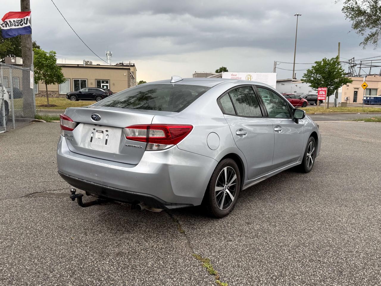 2019 Subaru Impreza Touring l AWD l 2.0 l 4Cyl l Auto l CarPlay Photo