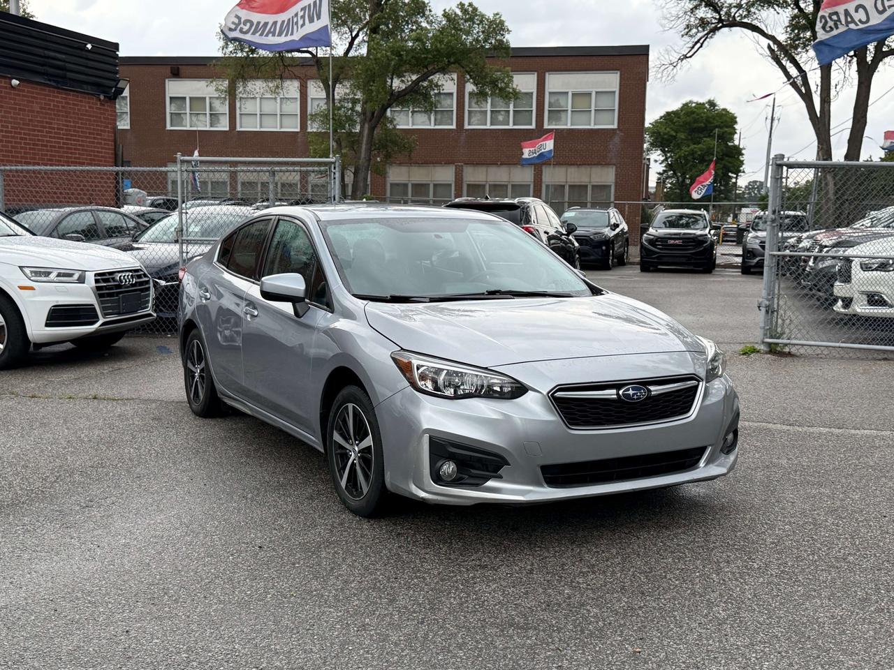2019 Subaru Impreza Touring l AWD l 2.0 l 4Cyl l Auto l CarPlay Photo