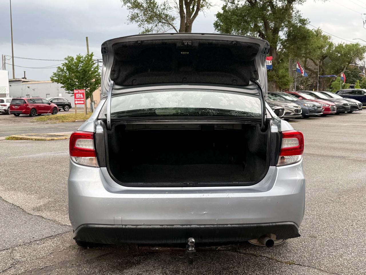 2019 Subaru Impreza Touring l AWD l 2.0 l 4Cyl l Auto l CarPlay Photo