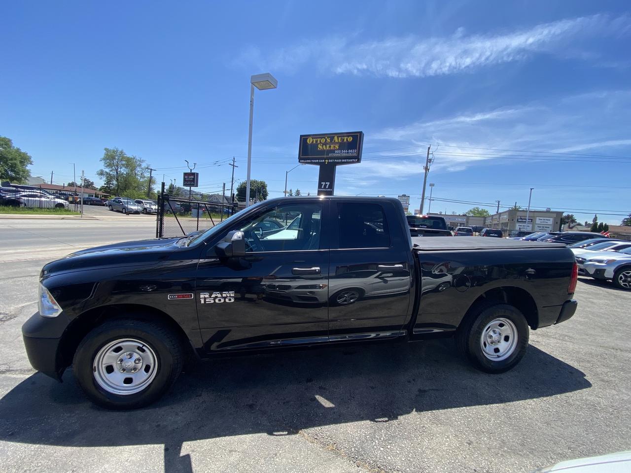 2016 RAM 1500 2WD Quad Cab 140.5  Tradesman Photo