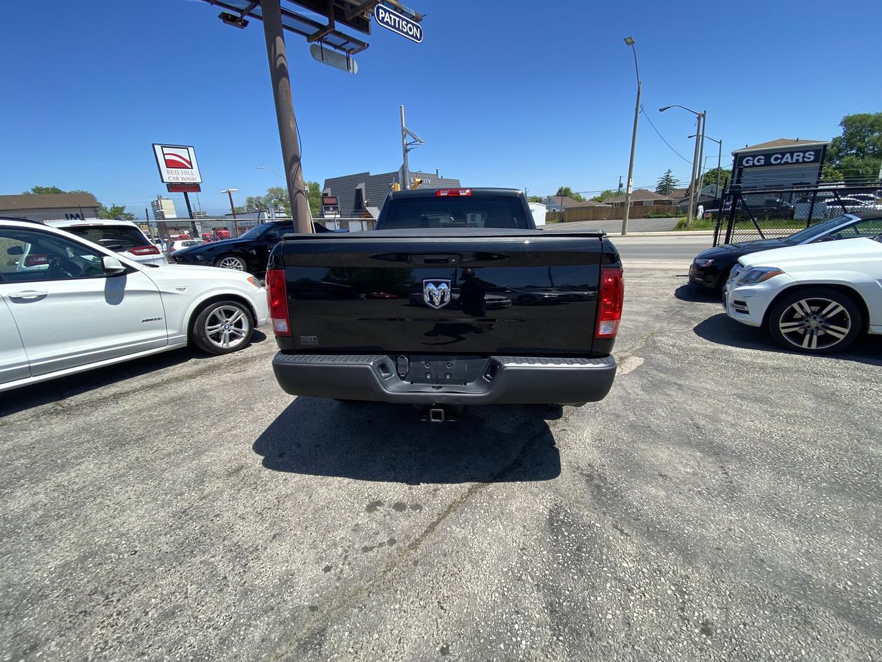 2016 RAM 1500 2WD Quad Cab 140.5  Tradesman Photo3