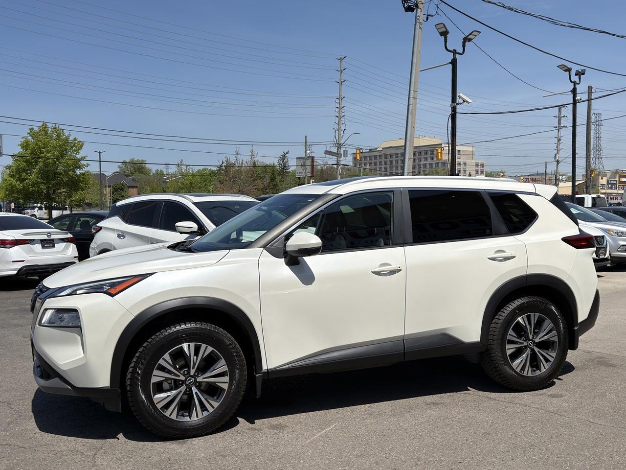2023 Nissan Rogue SV MOONROOF AWD Pearl White   360 Cam   Pro Pilot Photo
