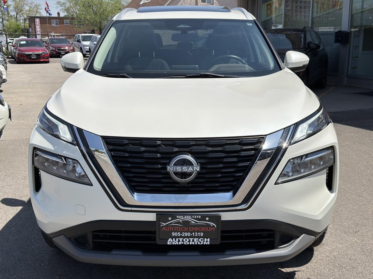 2023 Nissan Rogue SV MOONROOF AWD Pearl White   360 Cam   Pro Pilot Photo