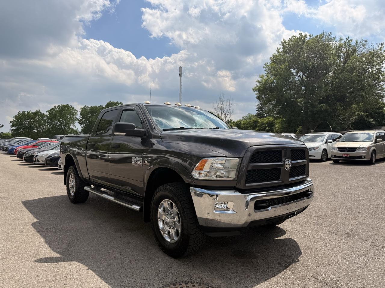 <p>Get ready for adventure with this rugged 2016 RAM 2500 Outdoorsman, a truck built for those who demand power and capability. Under the hood, youll find the legendary 6.7L Cummins Turbo Diesel engine, renowned for its immense torque and unwavering reliability, making it perfect for towing heavy loads or conquering challenging terrains. Paired with a smooth automatic transmission and robust 4-wheel drive, this RAM 2500 is equipped to handle whatever you throw its way, from weekend getaways to demanding work projects. This particular beauty, finished in a sophisticated grey exterior with a comfortable grey interior, has seen 157,740 kilometers and boasts a clean CARFAX report, offering you peace of mind.&nbsp;At Target Auto Centre, we understand what drivers are looking for in a truck, and this RAM 2500 Outdoorsman delivers. Whether youre a contractor needing a dependable workhorse, an outdoor enthusiast planning your next expedition, or simply someone who appreciates the brute strength and versatility of a heavy-duty pickup, this vehicle is a fantastic option. Come down to Target Auto Centre and experience the power and comfort for yourself.</p><p>&nbsp;</p><hr><p>&nbsp;</p><p dir=ltr><strong>CERTIFIED PRE-OWNED VEHICLE | BUY WITH CONFIDENCE</strong></p><p dir=ltr>&nbsp;- Ontario Safety Standards Certificate Included<br>- 30 Day / 1,000 KM Safety Warranty Included<br>- Fully Detailed Prior to Delivery<br>- CARFAX Vehicle History Report Available</p><p>&nbsp;</p><hr><p>&nbsp;</p><p dir=ltr><strong>FINANCING MADE SIMPLE | ALL CREDIT WELCOME</strong></p><p dir=ltr>&nbsp;- $0 Down Payment Options Available<br>- Competitive Rates Through Trusted Lenders<br>- Fast Approvals | Simple Application Process<br>- On-site Financing Assistance<br>- Good Credit | Bad Credit | No Credit Options<br>- <a href=https://targetauto.ca/financing/>Apply Now</a></p><p>&nbsp;</p><hr><p>&nbsp;</p><p dir=ltr><strong>VALUE AND TRANSPARENCY | WHY CHOOSE US</strong></p><p dir=ltr>- Price Plus HST & Licensing Only<br>- No Additional Fees | All-In Pricing<br>- Same Price Cash or Finance<br>- Extended Warranty Protection Plans Available<br>- Autotrader Best Priced Dealer Award (2024)<br>- Competitive Market Value on Trade-ins<br>- We&rsquo;ll Buy Your Car &mdash; No Purchase Required<br>- Know Someone Looking For a Vehicle? Get a Referral Award<br>- Open 7 Days a Week</p><p>&nbsp;</p><hr><p>&nbsp;</p><p dir=ltr><strong>ABOUT TARGET AUTO CENTRE</strong></p><p dir=ltr>Target Auto Centre has been proudly serving London, Ontario and surrounding areas for over 20 years, offering over 150 quality pre-owned vehicles and a constantly updated selection to choose from. We focus on providing competitive pricing, clear information, and a straightforward buying process so you know exactly what to expect from start to finish.</p><p dir=ltr>Cars For Everyone! We offer a wide selection of vehicles to fit every lifestyle, need, and budget. Our inventory includes cars, trucks, SUVs, and vans from trusted brands such as Ford, Chevrolet, Toyota, Honda, Nissan, BMW, Mercedes-Benz, Audi, Lexus, Acura, Hyundai, Kia, Mazda, Volkswagen, Jeep, RAM, GMC, Subaru, and more. With new arrivals regularly, there&rsquo;s always something for everyone.</p><p dir=ltr>As a proud member of the Used Car Dealers Association of Ontario (UCDA), we are committed to operating with honesty, transparency, and professionalism in every transaction. Our goal is to make your vehicle purchase as simple and stress-free as possible, while delivering the level of service our customers continue to trust. Come visit us today and see why were the preferred choice for pre-owned vehicles in London and the surrounding areas. We look forward to earning your business!</p>