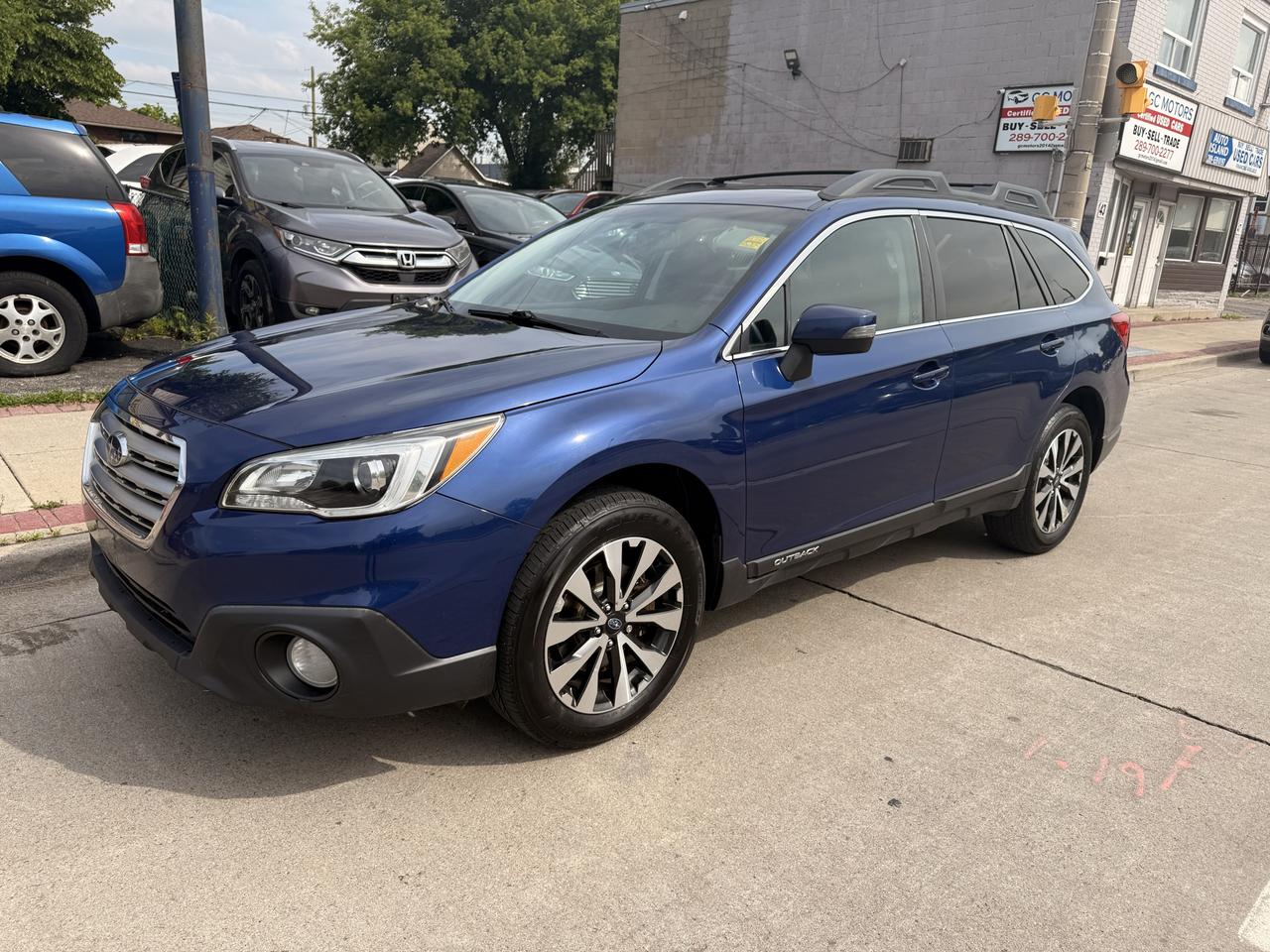 2015 Subaru Outback 5dr Wgn CVT 2.5i w/Limited & Tech Pkg Photo