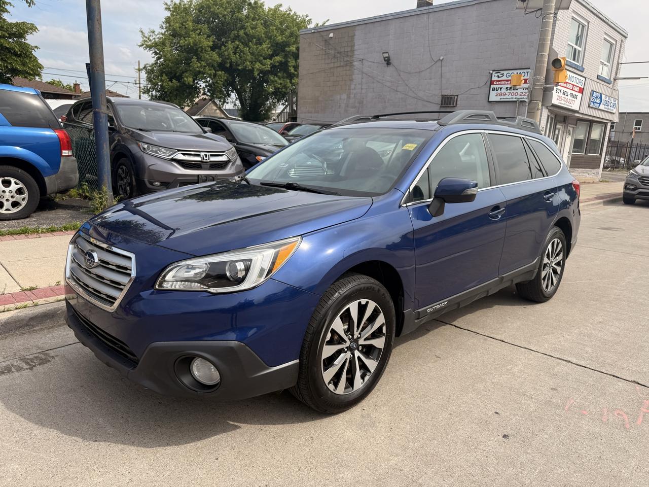 2015 Subaru Outback 5dr Wgn CVT 2.5i w/Limited & Tech Pkg Photo
