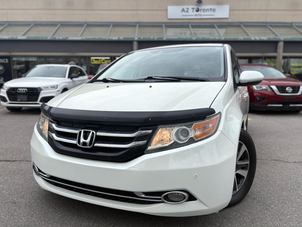 2015 Honda Odyssey 4DR WGN TOURING W/RES & NAVI Photo