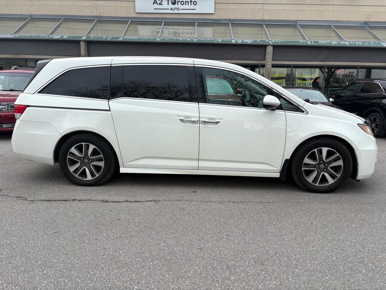 2015 Honda Odyssey 4DR WGN TOURING W/RES & NAVI Photo