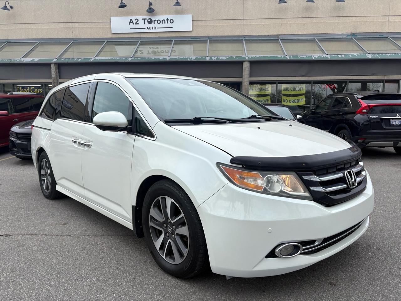 2015 Honda Odyssey 4DR WGN TOURING W/RES & NAVI Photo