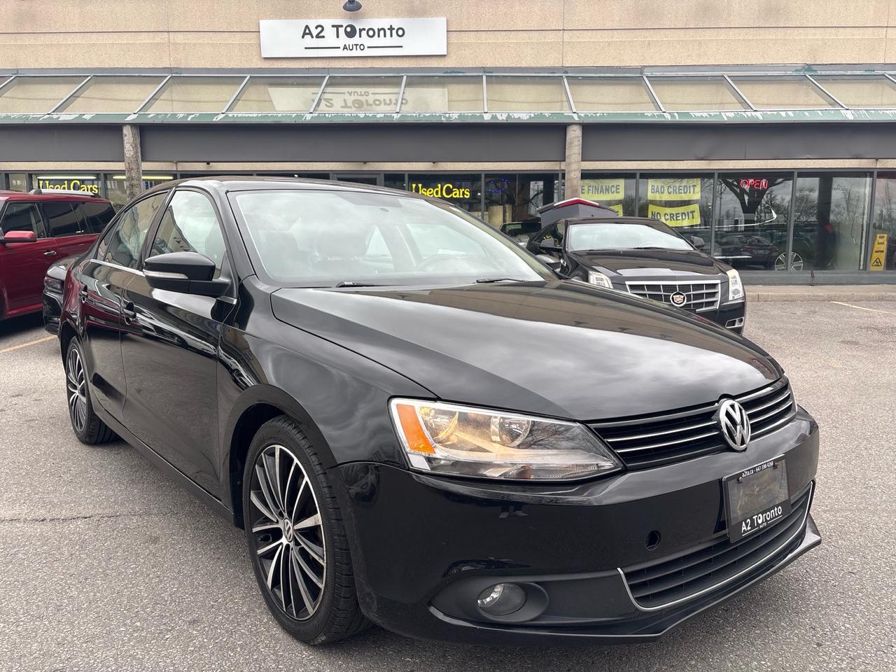 2014 Volkswagen Jetta 4dr 2.0 TDI DSG Highline Photo