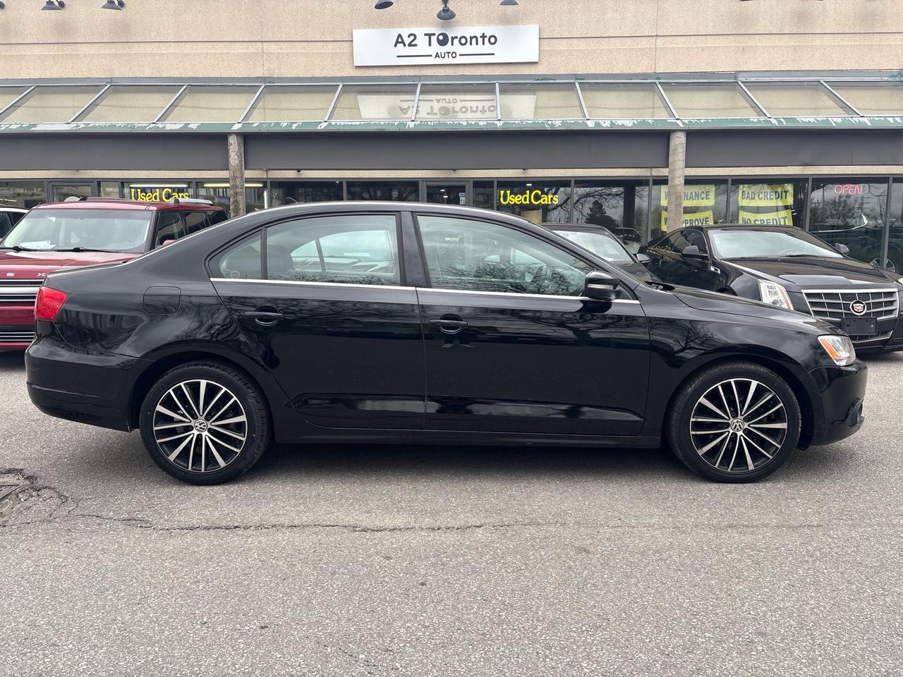 2014 Volkswagen Jetta 4dr 2.0 TDI DSG Highline Photo