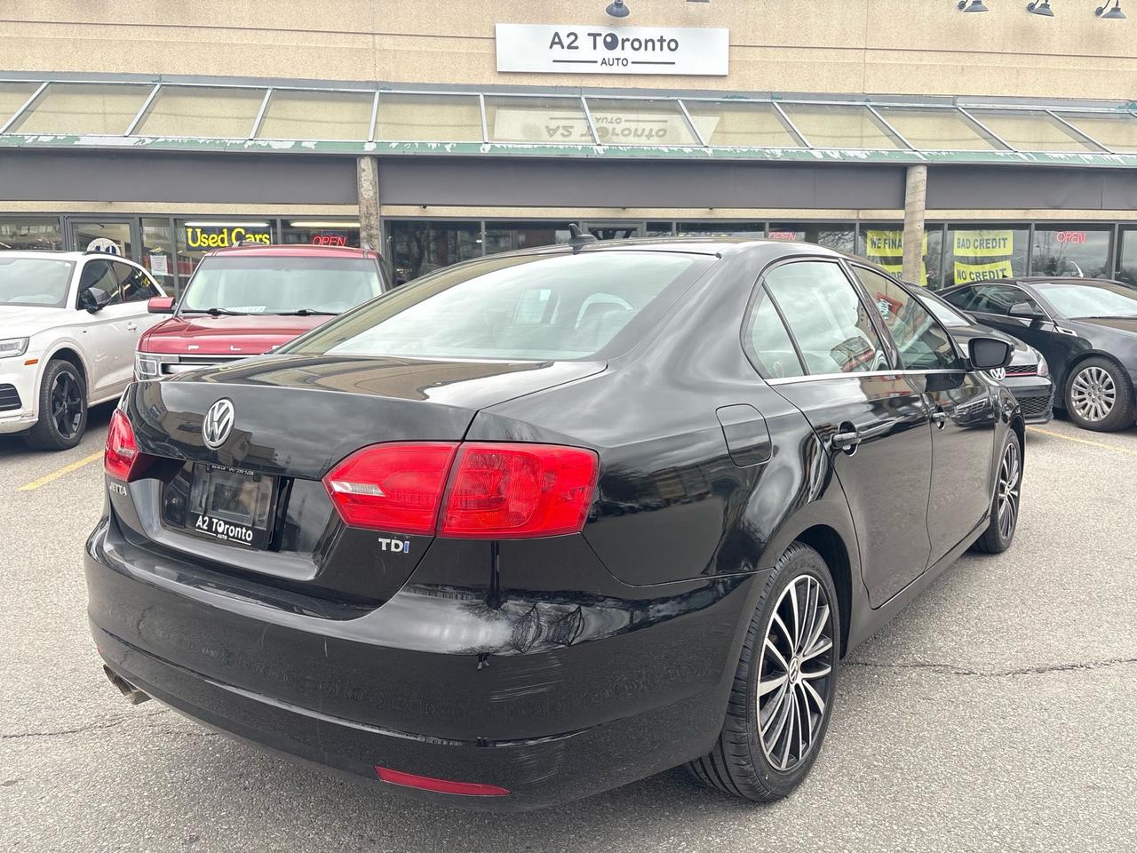 2014 Volkswagen Jetta 4dr 2.0 TDI DSG Highline Photo3