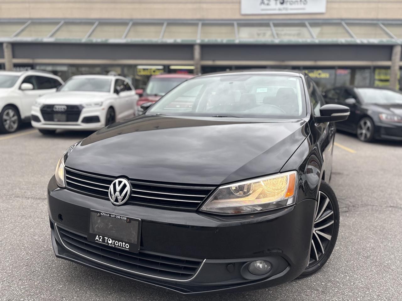 2014 Volkswagen Jetta 4dr 2.0 TDI DSG Highline Photo0