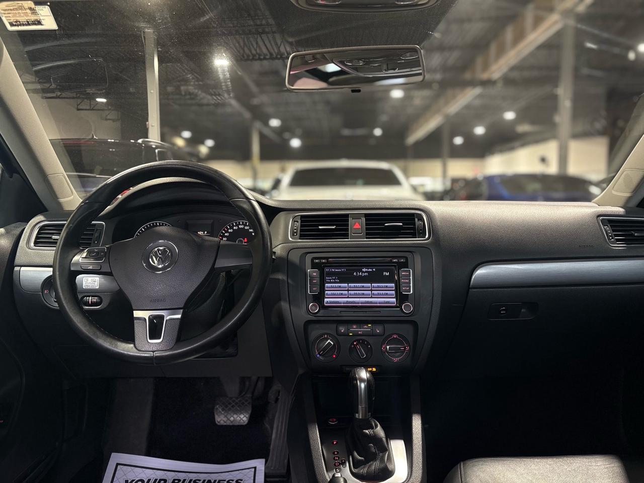 2014 Volkswagen Jetta 4dr 2.0 TDI DSG Highline Photo