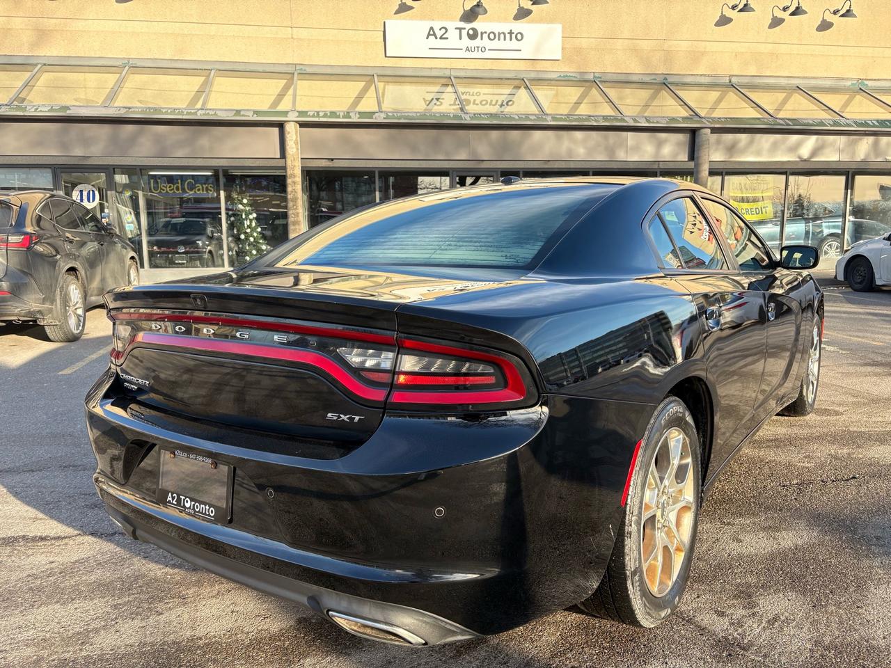2016 Dodge Charger 4dr Sdn SXT AWD Photo4