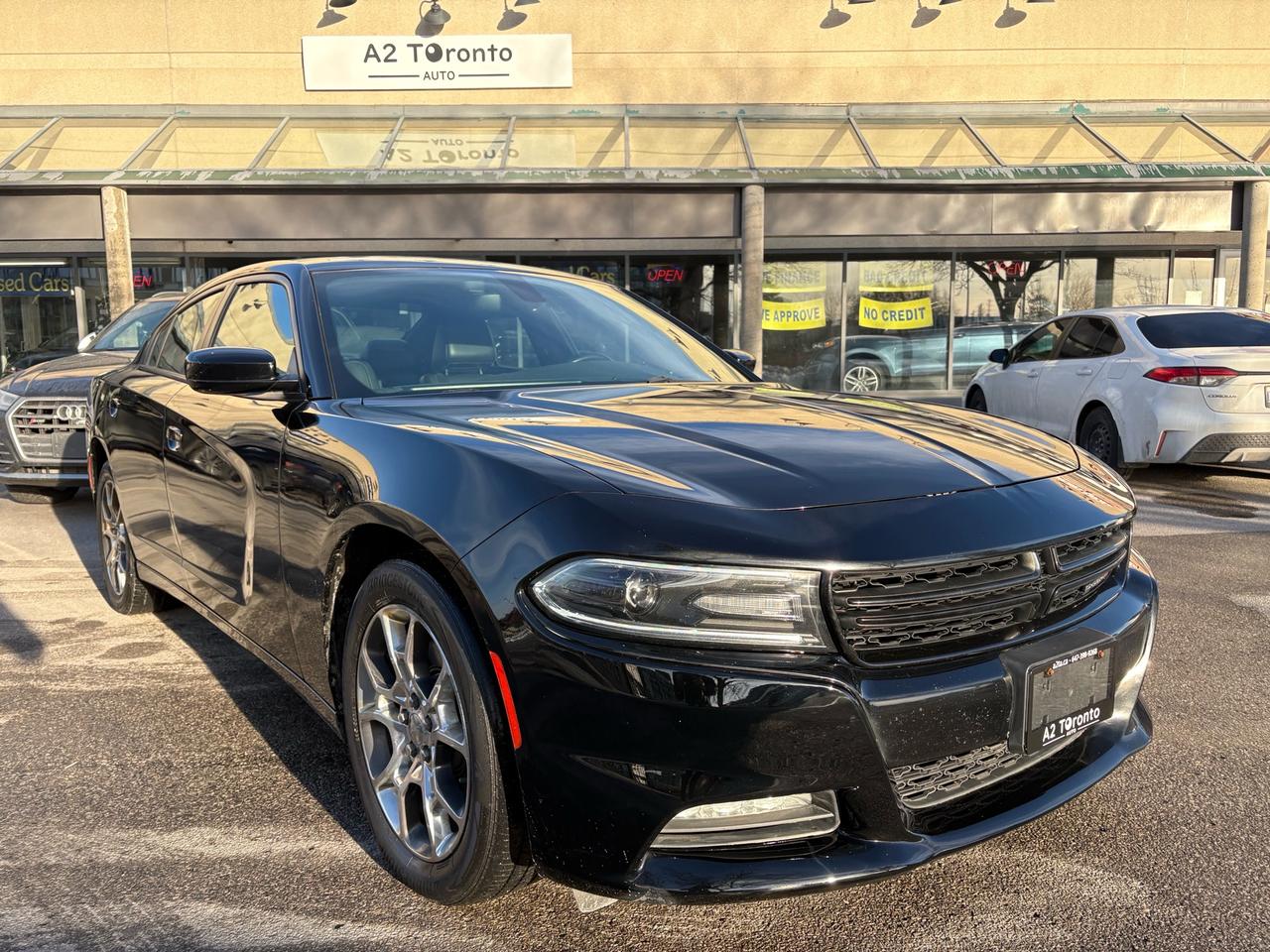 2016 Dodge Charger 4dr Sdn SXT AWD Photo2