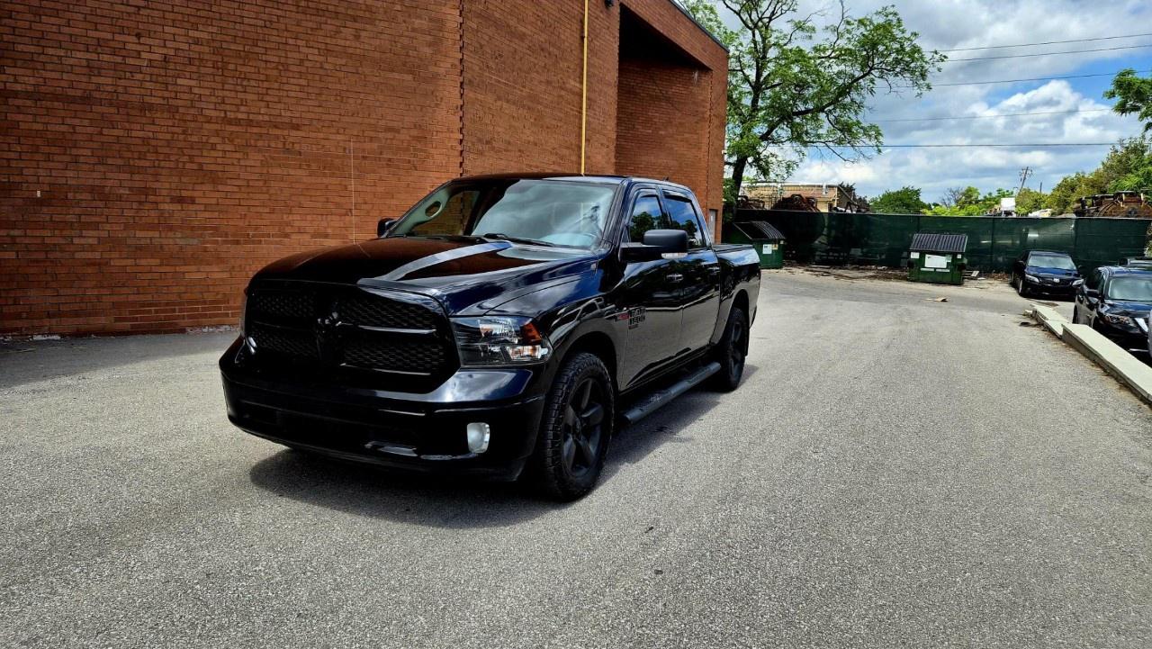 <p>TORQUE, EFFICIENCY & IMPECCABLE HISTORY! 2019 Ram 1500 Classic SLT Crew Cab 4x4  3.0L EcoDiesel V6  20 Service Records  Accident-Free!</p><p>Why compromise between massive towing muscle and fuel efficiency when you can have both? This <strong>2019 Ram 1500 Classic SLT Crew Cab 4x4</strong> is the ultimate solution for truck buyers who want heavy-duty capability with light-duty fuel costs. Built on Ram's timelessly rugged 4th-generation platform, the "Classic" model delivers proven durability and immense value.</p><p>This truck stands out with an immaculate pedigree: only <strong>two previous owners</strong>, a completely <strong>accident-free history</strong>, and zero insurance claims on its clean CarFax report. It has been fastidiously maintained and is ready to tackle Canadian winters, family road trips, or your heaviest trailers without breaking a sweat.</p><h3><strong>The EcoDiesel Advantage: Muscle Meets Economy</strong></h3><p>The crown jewel of this Ram 1500 is its <strong>3.0L EcoDiesel V6 engine</strong>. While gas-powered V8 trucks force you to live at the gas station, this turbo-diesel is an absolute fuel-sipping marvel.</p><ul><li><p><strong>Massive Low-End Torque:</strong> Pumps out a whopping 420 lb-ft of torque at just 2,000 RPM, giving you effortless pulling power right off the line.</p></li><li><p><strong>Highway Cruising Range:</strong> Capable of achieving incredible fuel economy (around 10.2L/100km), allowing you to pull up to 9,000+ lbs while getting over 900 km on a single tank of fuel.</p></li><li><p><strong>8-Speed Excellence:</strong> Paired with the renowned ZF Torqueflite 8-speed automatic transmission for seamless, intelligent shift points whether empty or fully loaded.</p></li></ul><h3><strong>Spacious Crew Cab & Premium SLT Comforts</strong></h3><p>Step inside a true mobile office. The <strong>Crew Cab</strong> configuration means your rear passengers get expansive legroom, making it just as comfortable as a luxury SUV.</p><ul><li><p><strong>6-Passenger Versatility:</strong> The front 40/20/40 split-bench seat folds up instantly to accommodate a sixth passenger, or down to act as a massive center console with built-in storage.</p></li><li><p><strong>Uconnect® Touchscreen:</strong> Features a crisp, intuitive center infotainment screen complete with Bluetooth connectivity, hands-free calling, and USB media inputs.</p></li><li><p><strong>All-Weather Capability:</strong> Electronic shift-on-the-fly 4WD allows you to shift into 4-High or 4-Low effortlessly to handle deep snow, mud, or loose gravel.</p></li><li><p><strong>Power & Convenience:</strong> Full power windows, locks, heated power side mirrors, remote keyless entry, and cruise control.</p></li></ul><p>Credit Cards Accepted</p><p>Please call for more info and to book a test drive at 888-996-6510. Car-Fax is included in the asking price. Extended Warranties are also available. We offer financing too. Certification: Have your new pre-owned vehicle certified. We offer a full safety inspection including oil change, and professional detailing prior to delivery. Certification package is available for $799. All trade-ins are welcome. Taxes and licensing are extra.***</p>