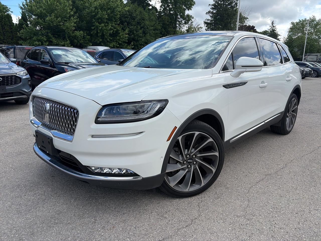 <p>Experience refined luxury and confident capability with this pre-owned 2022 Lincoln Nautilus Reserve AWD, now available at Winegard Ford. This exceptional SUV offers a sophisticated driving experience, perfect for navigating Canadian roads in any season. With only 92,862 kilometers on the odometer, this Nautilus is ready to embark on your next adventure, providing a blend of comfort, technology, and performance that defines the Lincoln brand.</p><p>&nbsp;</p><p>Step inside and discover a cabin designed for your ultimate comfort and convenience. The 2022 Lincoln Nautilus Reserve AWD boasts a suite of premium features that elevate every drive. From the advanced Lincoln Co-Pilot360 suite of safety technologies to the luxurious appointments throughout, this vehicle is engineered to impress. Whether youre commuting to work or heading out for a weekend getaway, the Nautilus delivers a serene and connected driving environment.</p><p>&nbsp;</p><p>Here are five standout features that make this 2022 Lincoln Nautilus Reserve AWD truly special:</p><p><br><br></p><ul><li><strong>Panoramic Vista Roof:</strong> Immerse yourself in natural light and enjoy breathtaking views with the expansive sliding and tilting glass sunroof, extending over both the first and second rows.</li></ul><p>&nbsp;</p><ul><li><strong>Lincoln Co-Pilot360&trade; Suite:</strong> Drive with unparalleled peace of mind thanks to advanced safety features like Blind Spot Information System (BLIS), Automatic Emergency Braking, and Cross-Traffic Alert.</li></ul><p>&nbsp;</p><ul><li><strong>Heated Steering Wheel & Heated Rear Seats:</strong> Conquer chilly Canadian mornings with the luxurious warmth of a heated steering wheel and the added comfort of heated rear seats for all passengers.</li></ul><p>&nbsp;</p><ul><li><strong>Connected Navigation with Real-Time Traffic:</strong> Stay on course and informed with the integrated navigation system, enhanced by real-time traffic updates to help you avoid delays.</li></ul><p>&nbsp;</p><ul><li><strong>13-Speaker Revel&reg; Audio System:</strong> Experience your music like never before with a premium audio system designed to deliver crystal-clear sound and immersive acoustics.</li></ul><p><br><br></p><p><strong><em>Powered by AutoIntelligence&trade;</em></strong></p><p>&nbsp;</p><p>Vehicle information has been generated using artificial intelligence and is provided for informational purposes only. While efforts are made to ensure accuracy, please confirm all details directly with the dealer.</p><p>&nbsp;</p>