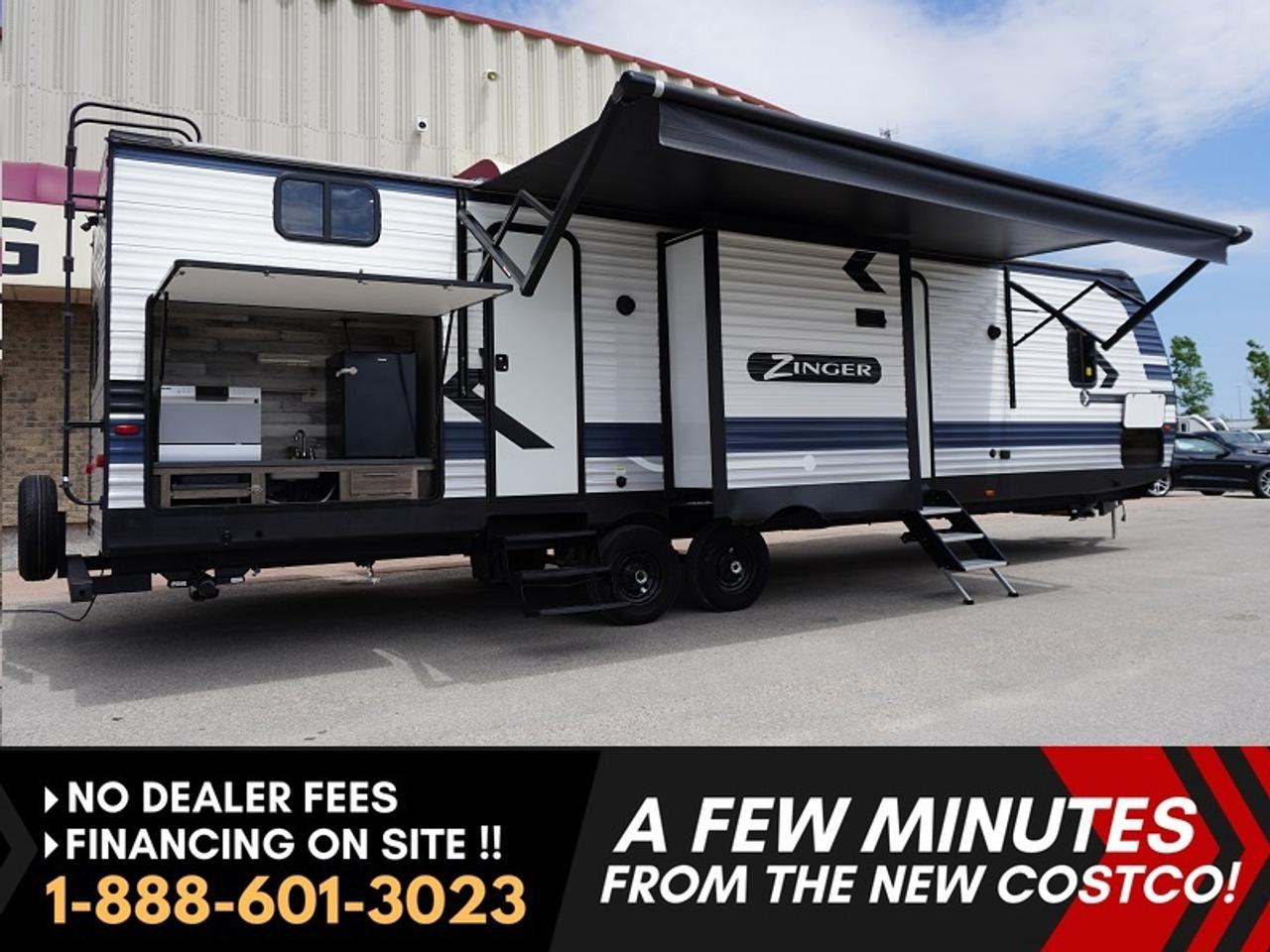 *** Dealer arranged financing on site! Quick, Simple, no calls or waiting on bank appointments required!! ***   NO ADMINISTRATION FEES!!

Spacious and family-friendly ** 2023 CrossRoads Zinger 331BH ** Massive private bunkhouse layout!! - - Private master with queen bed - - Walk-through full bathroom - - Massive 12ft long Thomas Payne modular RV leather theater reclining seating!!! Custom made to fit 5 people - - Residential style kitchen with island and breakfast bar seating - -  Dual sink  - -  Built in fireplace - - Second half-bathroom with dual access from inside and outside access - - Flip up bunk - - Jack-knife sofa - - Top bunk with large wardrobe - - Outdoor kitchen with 2 burner stove - - Outdoor portable dishwasher and sink - - Outdoor mini fridge - - Outdoor shower - - Exterior Speakers - - 20 ft power awning - - Fully walkable roof - - Roof ladder - -  Full pass through storage  - -  Fully enclosed and heated underbelly - - Pre-wired for solar!!!!

The exterior is in excellent condition. Aluminum siding with a smooth front. Side-to-side exterior storage. The interior is huge!!!! The triple slide-outs create a spacious interior perfect for entertaining.  With tons of windows allowing natural light throughout the entire camper.  The residential style features do make this camper feel more like a home.  A custom ordered reclining 12ft sofa.  The private master with a queen bed at the front of the camper, with your own walkthrough bathroom.  The private bunkhouse at the rear of the camper, gives you more than enough space to sleep up to 6 to 8 people.  With its own bathroom as well. 

Great history! It has been well maintained and well taken care of. This is a unit that is ready for more memories to be created!  Units of this size and with these many custom features are rare!  Special ordered with many extra added!!!  Outdoor kitchen with the beer fridge and sink.  Double burner cook top, as well why not a dishwasher.  This camper was made for camping but will be more like glamping.  It will do that and so much more with the spacious interior and added amenities. 

Features
- Front private bedroom
- Mirrors in Closet
- Queen bed
- Rear private bunkhouse
- Flip-up bunk 
- Jack knife sofa
- Second bunk
- Wardrobe/entertainment center
- Outdoor Speakers 
- LED Accents
- Outdoor kitchen w/ countertop dishwasher 
- Outdoor stove
- Outdoor mini-fridge
- Solar Power Prep
- Outside Shower 
- Flush floor slide-out large windows
- Pleated shades
- LED lighting
- 10 Cu. Ft.12-Volt refrigerator
- Backsplash
- Decorative cabinet glass
- Maple cabinet drawers
- Microwave
- Oven w/ LED glass top
- Pressed countertop w/ sink cover
- Range hood w/ light & exhaust fan
- Stainless-steel high-rise faucet
- Stainless steel sink
- 39" TV 
- USB ports 
- Bluetooth soundbar
- Fireplace 
- Walk through full bathroom
- Glass shower door & radius shower 
- Linen storage
- Mirrored medicine cabinets
- Half-bathroom with access from outside
- Aerodynamic Front End
- Backup Camera Prep
- Power Stabilizer Jacks
- 81" Interior Ceiling Height
- Spare tire

***EXTENDED WARRANTY options available to choose from to protect your RV and your wallet. (HUGE VALUE!!!) Zero down financing OAC with very Low monthly payments avail. Please see dealer for details. Trades accepted. View at Winnipeg West Automotive Group, 5195 Portage Ave. Dealer permit # 6007, Call now 1-(888) 601-3023.