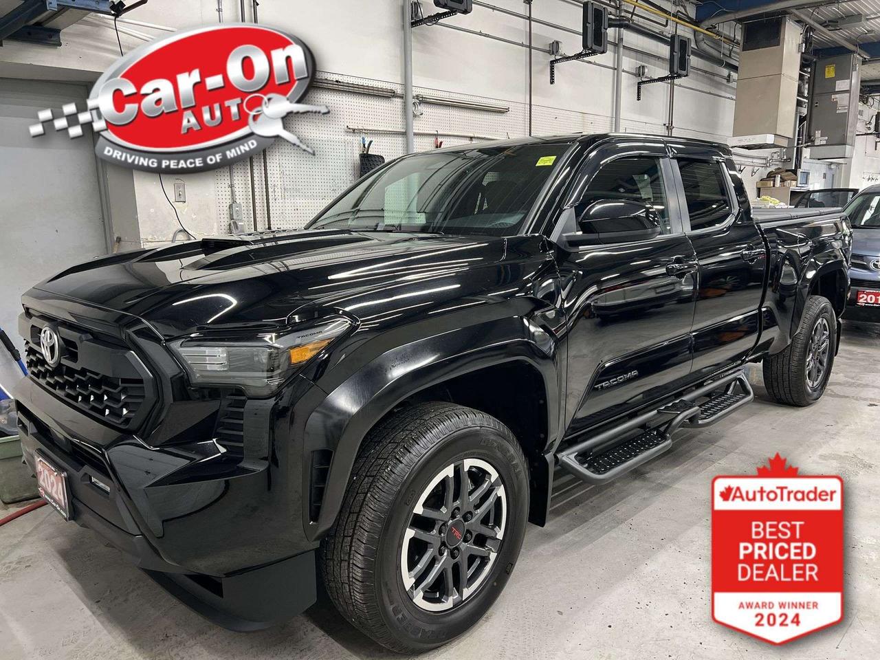 ONLY 16,000KMS!! TRD Sport 4X4 Double cab w/ Heated seats, Android Auto/ Apple CarPlay, 18-inch alloys, adaptive cruise control, blind spot monitor, rear cross-traffic alert, pre-collision system, lane departure warning, backup camera, tow package, hard folding tonneau cover, 6-foot box w/ bedliner, crawl control, automatic climate control, keyless entry w/ push start, power locks, power mirrors, power windows, automatic headlights w/ auto highbeams, Bluetooth and Sirius XM!!