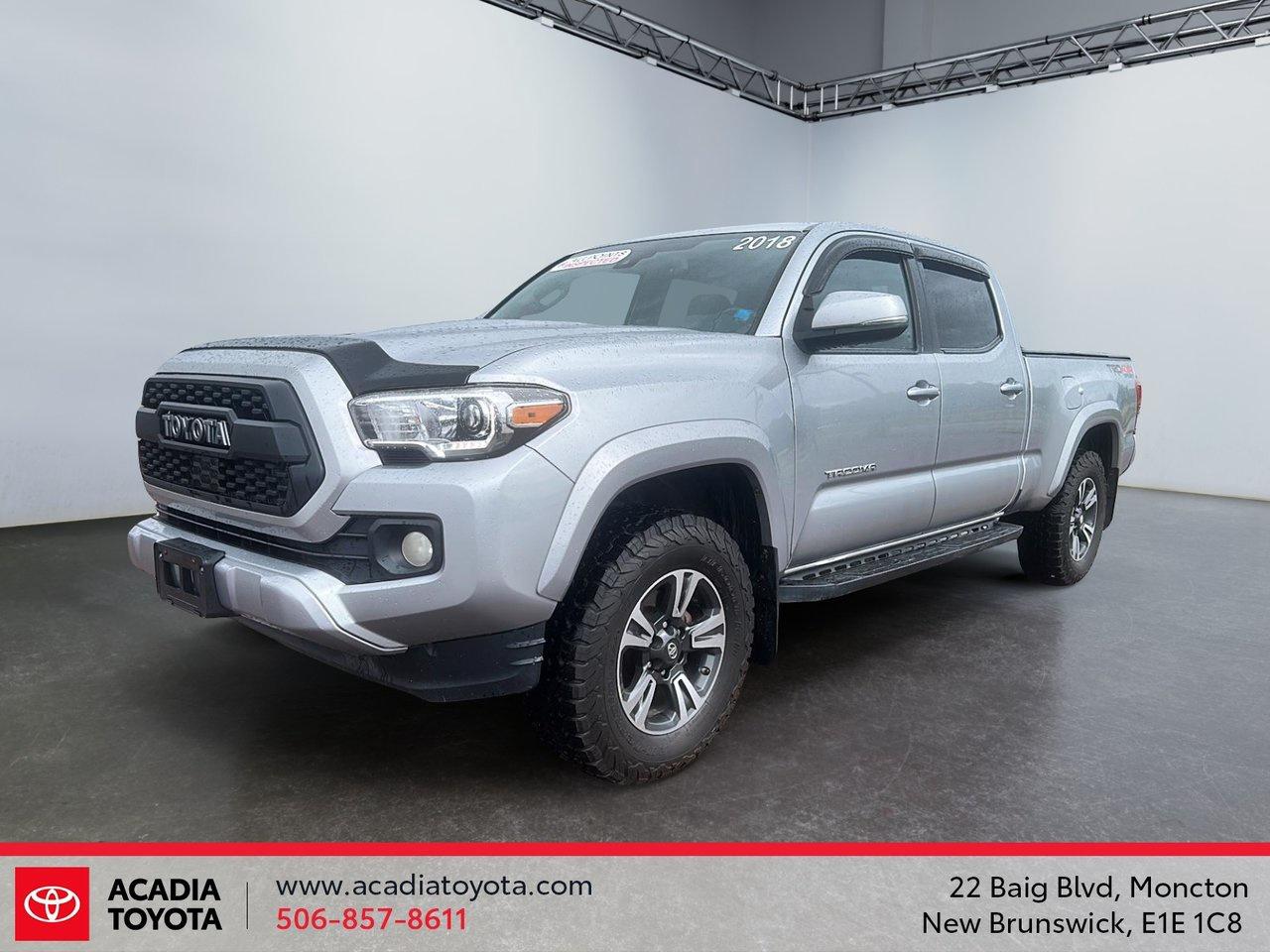 Awards:

  * 2018 KBB.com Best Resale Value Awards   * 2018 KBB.com 10 Most Awarded Brands   * 2018 KBB.com 5-Year Cost to Own Awards Midnight Black Metallic 2018 Toyota Tacoma SR5 V6 4WD 6-Speed Automatic 3.5L V6 DOHC 24V LEV3-ULEV70 278hp





This vehicle is being sold AS-IS, WHERE-IS with no warranty, express or implied. It has received a, NEW 2 YEAR MVI INSPECTION DONE HERE AT ACADIA TOYOTA, 4WD, 6 Speakers, ABS brakes, Brake assist, Electronic Stability Control, Power steering, Power windows.