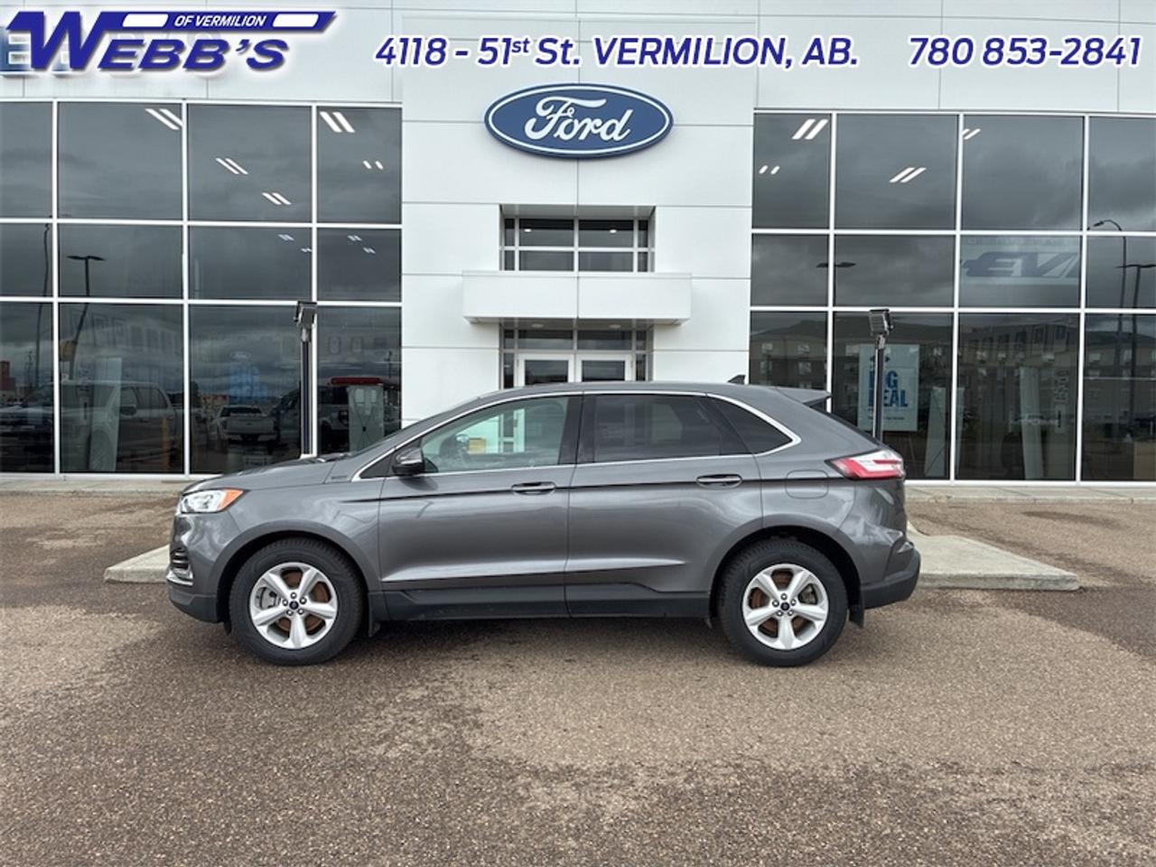 <p>Experience sophistication and capability with this stunning used 2022 Ford Edge Titanium, now available at Webbs Ford. Dressed in a sleek Carbonized Grey Metallic exterior and featuring a refined Ebony interior, this SUV crossover is designed to impress both on the road and in your driveway. The spacious four-door design offers comfortable seating for everyone, while the all-wheel-drive system ensures confidence and control no matter the driving conditions Canada throws your way. With 98,641 kilometers, this well-maintained Edge Titanium is ready for its next adventure.</p><p>This 2022 Ford Edge Titanium is more than just a vehicle; its a statement of style and a testament to cutting-edge automotive engineering. Whether youre navigating city streets or embarking on a weekend getaway, the Edge Titanium delivers a premium driving experience. Webbs Ford is proud to offer this exceptional used SUV, meticulously inspected and ready to be your next ride.</p><p>Here are five of the most exciting features of this 2022 Ford Edge Titanium:</p><ul><li><strong>Titanium Trim Excellence:</strong> The top-tier Titanium trim signifies a commitment to luxury and advanced features, offering a truly upscale experience in every drive.</li><li><strong>All-Wheel Drive Capability:</strong> Conquer any terrain or weather with the intelligent All-Wheel Drive system, providing enhanced traction and stability for peace of mind.</li><li><strong>Spacious SUV/Crossover Design:</strong> Enjoy the perfect blend of passenger comfort and cargo versatility, making it ideal for families, road trips, and everyday life.</li><li><strong>Automatic Transmission:</strong> Effortlessly glide through gears with the smooth and responsive automatic transmission, ensuring a relaxed and enjoyable driving experience.</li><li><strong>Striking Carbonized Grey Metallic Exterior:</strong> Turn heads with the sophisticated and modern Carbonized Grey Metallic paint, reflecting a sense of premium style.</li></ul><p><strong><em>Powered by AutoIntelligence&trade;</em></strong></p><p>Vehicle information has been generated using artificial intelligence and is provided for informational purposes only. While efforts are made to ensure accuracy, please confirm all details directly with the dealer.</p>