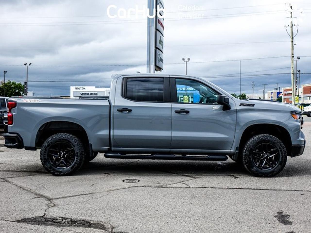 2024 Chevrolet Silverado 1500 Custom Trail Boss 4WD Crew Cab 147" Photo