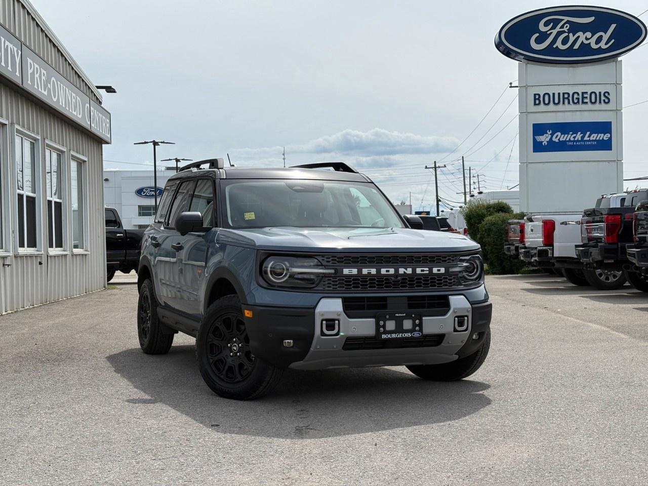 <p>Experience the rugged elegance of the 2025 Ford Bronco Sport Badlands, finished in a striking gray with a capable 4x4 drivetrain. This SUV combines power and refined handling, making it perfect for Canadian roads all year round.</p><p>The exterior of this Bronco Sport is designed to turn heads with alloy wheels that enhance its bold presence. Inside, you'll find a gray interior that balances comfort and style, featuring luxurious leather seats and a heated steering wheel for those chilly Canadian mornings.</p><p>Stay connected and safe with advanced technology including a backup camera, Bluetooth connection, and smart device integration. The SUV comes equipped with modern conveniences like a large screen for easy navigation and driver assistance features such as lane assist, adaptive cruise control, and parking sensors.</p><p>Whether you're an adventurer at heart or a family seeking reliability, the 2025 Ford Bronco Sport Badlands offers the versatility you need with features like remote start and heated front seats. Contact Bourgeois Motors Ltd. today to learn more and take a test drive of this exceptional vehicle.</p> <p><strong>Why Choose the Bourgeois Auto Group?</strong></p><p>For 80 years, Bourgeois Auto Group has been delivering exceptional automotive experiences. Our factor trained teams work to ensure you receive the shopping experience you deserve; whether you're looking for a new or new-to-you vehicle.</p><p>Shop 24/7 with our online showroom and chat service, ensuring convenience every step of the way. No hidden fees, full disclosure, and every pre-owned vehicle comes with a Carfax® report for peace of mind.</p><p>We offer a wide selection of pre-owned vehicles, all competitively priced using real-time market data. Get the best deal on your purchase and trade-in with our free Live Market Analysis report.</p><p>Looking to sell your car? We buy any make or modelno purchase required. Our simple to use online trade valuation tool will provide you with a clear, transparent selling experience whether you buy our car or not.</p><p>Backed by hundreds dedicated employees across 4 convenient locations, were here to meet all your automotive needs. Visit us in Midland or Parry Sound and explore our inventory or schedule your next service today.</p> <p><strong>Financing Your Next Vehicle with Bourgeois Motors Ford in Midland:</strong></p><p>At Bourgeois Motors Ford, we make financing your next vehicle simple and stress-free! Our team works with trusted lenders to find flexible options tailored to your budget. Drive away with confidenceapply today!</p><p>Take advantage of our online pre-qualification tool, backed by Equifax and TD Bank to find the payment that works for you. Simply <a href=https://www.bourgeoismotors.com/free-credit-check/ rel=nofollow><strong>CLICK HERE</strong></a><strong> </strong>to use our secure online credit tool with no impact to your credit.</p>