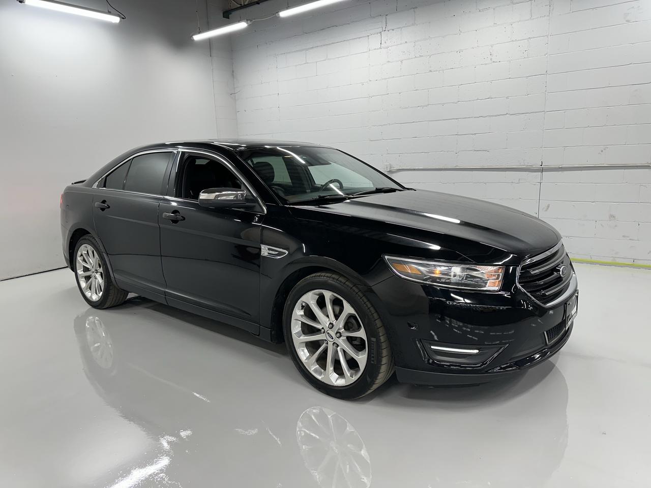 <p>Prepare to command the road in this sleek, pre-owned 2016 Ford Taurus 4DR SDN LIMITED AWD, a sophisticated sedan ready for your next adventure. Dressed in a timeless black exterior and complemented by a refined black interior, this Taurus exudes an air of quiet confidence. Under the hood, the robust 3.5L V6 engine provides ample power for both city commutes and highway cruising, while the Flex Fuel capability offers you flexibility at the pump. Whether youre navigating slick Canadian winter roads or enjoying a sunny summer drive, the All-Wheel Drive system ensures confident handling and stability in all conditions.</p><p>This 2016 Ford Taurus, with just 148,851 kilometers on the odometer, is a testament to its enduring quality and thoughtful design. The spacious four-door sedan body style offers comfortable seating for you and your passengers, making it an ideal choice for families or anyone who values a smooth and composed ride. Troys Toys is proud to offer this exceptional vehicle, a blend of performance, comfort, and dependable Ford engineering.</p><p>Here are five features of this 2016 Ford Taurus that truly shine:</p><ul><li><strong>All-Wheel Drive (AWD):</strong> Conquer any Canadian weather with unwavering confidence, from snowy backroads to rain-slicked highways, this AWD system provides superior traction and control.</li><li><strong>Powerful 3.5L V6 Engine:</strong> Experience exhilarating acceleration and smooth, responsive power that makes every drive a pleasure, whether youre merging onto the highway or tackling a mountain pass.</li><li><strong>LIMITED Trim:</strong> Indulge in an elevated driving experience with the premium features and refined appointments that come standard with the LIMITED trim level.</li><li><strong>Flex Fuel Capability:</strong> Enjoy the freedom to choose your fuel, offering you flexibility and potential cost savings at the pump.</li><li><strong>Sleek Black Exterior & Interior:</strong> Make a statement with this classic and sophisticated colour combination that exudes timeless style and luxury, turning heads wherever you go.</li></ul><p><strong><em>Powered by AutoIntelligence&trade;</em></strong></p><p>Vehicle information has been generated using artificial intelligence and is provided for informational purposes only. While efforts are made to ensure accuracy, please confirm all details directly with the dealer.</p>