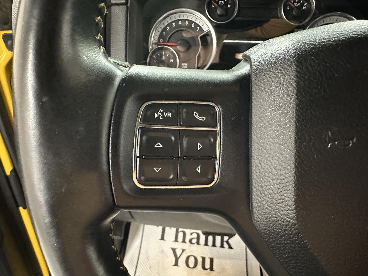 2016 RAM 1500 4WD Crew Cab 140.5" Sport Photo14