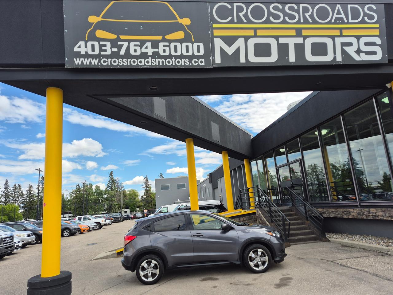 <p>The 2017 Honda HR-V EX is a highly practical, subcompact crossover SUV powered by a 1.8-liter 4-cylinder engine that produces 141 horsepower and 127 lb-ft of torque. The EX trim stands out for its generous upgrades, including heated front seats, a power moonroof, and Honda LaneWatch, while offering exceptional cargo versatility. Key Specifications & Features Engine: 1.8L 4-Cylinder paired with a Continuously Variable Transmission (CVT) Drivetrain: All-Wheel Drive (AWD) Fuel Economy: Averages up to 34 mpg Exterior: 17-inch alloy wheels, fog lights, heated side mirrors with integrated turn signals, and rear privacy glass Interior: Heated front seats, push-button start, auto-climate control, and 7-inch touchscreen Safety: Features Honda LaneWatch, which projects a live view of your right blind spot onto the touchscreen Cargo: Equipped with Hondas unique Magic Seat that folds completely flat or flips up to accommodate tall or bulky items Dimensions & Capacities Overall Length: 169.1 inches Cargo Space: 23.2 cubic feet behind the rear seats, expanding to 55.9 cubic feet with seats folded Towing Capacity: Not recommended for towing.</p><p><br>Contact Us Today to Schedule a Test Drive! 🚗</p><p>🚗 CREDIT REBUILDING SPECIALISTS<br>✅ Instant Approval: Apply Now at www.crossroadsmotors.ca/forms/finance<br>✅ All Credit Accepted &ndash; Specializing in credit rebuild programs!<br>✅ Fast Approvals &ndash; Flexible financing options for all credit situations!</p><p>🔧 Mechanical Fitness Assessment Complete &ndash; Ensuring reliability<br>🔍 CarFax & Inspection Reports Available &ndash; Full transparency<br>📄 Financing & Extended Warranty Options &ndash; Flexible solutions tailored to you</p><p>📍 Visit Us At: 7330 Macleod Trail SE, Calgary, AB T2H 0L9<br>📞 Call: 403-764-6000</p><p>AMVIC Licensed Dealer</p><p>Your perfect car is waiting&mdash;contact us now! 🚗✨</p><p>&nbsp;</p>