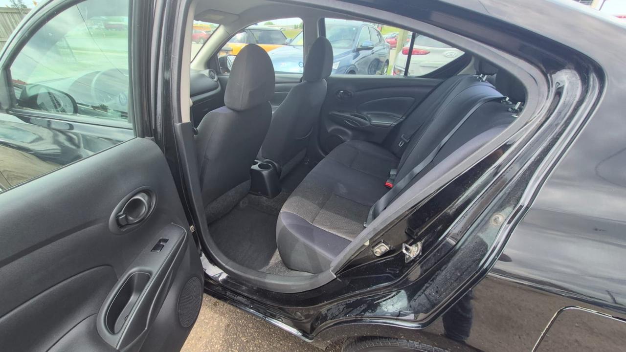 2012 Nissan Versa SV, MANUAL, SEDAN, GREAT ON FUEL, CERTIFIED Photo