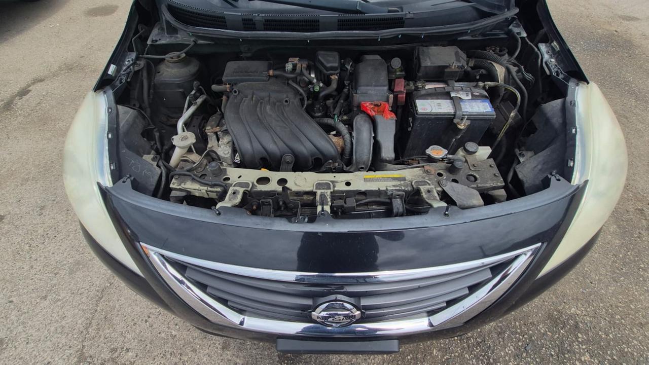 2012 Nissan Versa SV, MANUAL, SEDAN, GREAT ON FUEL, CERTIFIED Photo