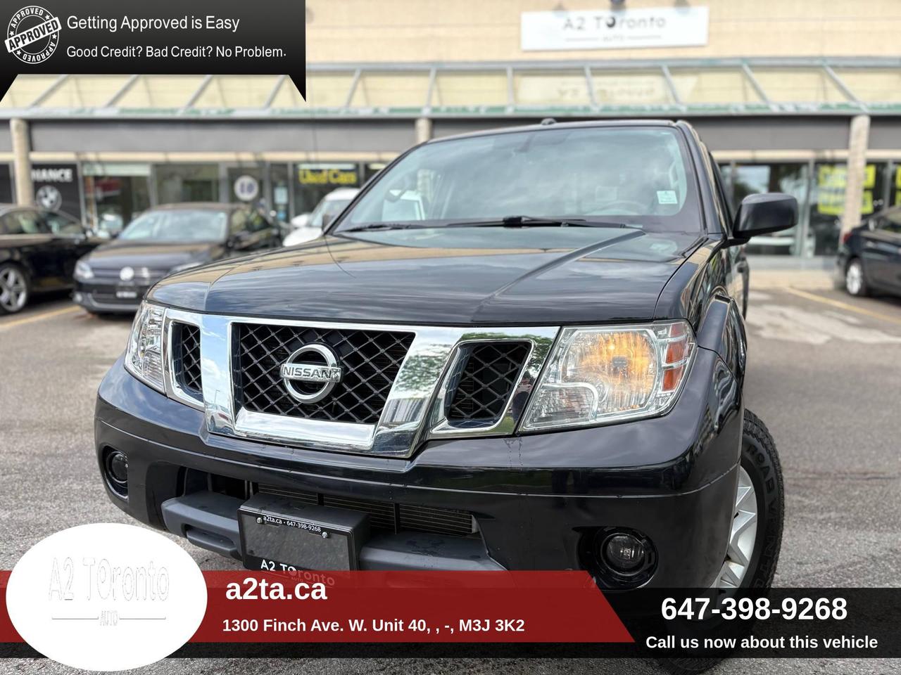 2016 Nissan Frontier 4WD Crew Cab LWB Auto Photo0