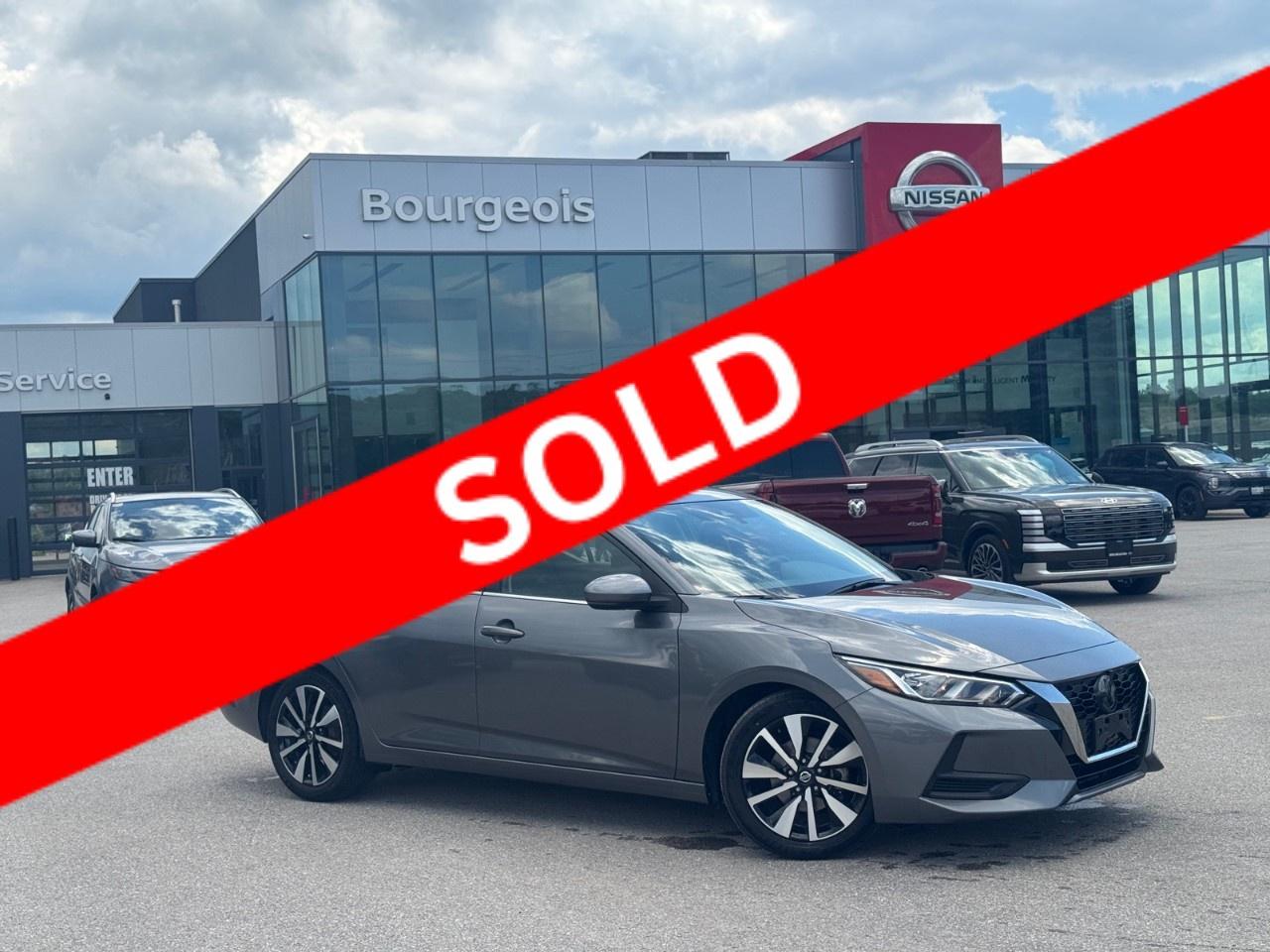 <p>Experience the harmonious blend of style and performance with the 2022 Nissan Sentra SV CVT in a sophisticated gray finish. This front-wheel-drive sedan is designed to offer exceptional handling for the modern driver, making every journey smooth and efficient.</p><p>The Sentra's exterior is accentuated by its sleek alloy wheels, while inside, a refined black interior creates a welcoming atmosphere. The cabin is thoughtfully equipped with conveniences such as heated front seats and mirrors, a leather steering wheel, and advanced features like smart device integration, ensuring a comfortable and connected drive.</p><p>Stay ahead of the curve with state-of-the-art technology designed to enhance your safety and entertainment. The Sentra comes equipped with a backup camera, Bluetooth connection, and satellite radio for endless entertainment options. Safety features such as lane assist, adaptive cruise control, brake assist, and parking sensors offer peace of mind on every trip.</p><p>This vehicle is ideal for individuals who value a combination of safety, comfort, and advanced technology in a stylish package. Contact Bourgeois Midland Nissan today to schedule a test drive and experience the capabilities of the 2022 Nissan Sentra SV CVT for yourself!</p> <p><strong>Why Choose the Bourgeois Auto Group?</strong></p><p>For 80 years, Bourgeois Auto Group has been delivering exceptional automotive experiences. Our factor trained teams work to ensure you receive the shopping experience you deserve; whether you're looking for a new or new-to-you vehicle.</p><p>Shop 24/7 with our online showroom and chat service, ensuring convenience every step of the way. No hidden fees, full disclosure, and every pre-owned vehicle comes with a Carfax® report for peace of mind.</p><p>We offer a wide selection of pre-owned vehicles, all competitively priced using real-time market data. Get the best deal on your purchase and trade-in with our free Live Market Analysis report.</p><p>Looking to sell your car? We buy any make or modelno purchase required. Our simple to use online trade valuation tool will provide you with a clear, transparent selling experience whether you buy our car or not.</p><p>Backed by hundreds dedicated employees across 4 convenient locations, were here to meet all your automotive needs. Visit us in Midland or Parry Sound and explore our inventory or schedule your next service today.</p> <p><strong>Financing Your Next Vehicle with Bourgeois Midland Nissan:</strong></p><p>At Bourgeois Midland Nissan, we make financing your next vehicle simple and stress-free! Our team works with trusted lenders to find flexible options tailored to your budget. Drive away with confidenceapply today!</p><p>Take advantage of our online pre-qualification tool, backed by Equifax and TD Bank to find the payment that works for you. Simply <a href=https://www.bourgeoisnissan.com/pre-qualify-for-financing/ rel=nofollow><strong>CLICK HERE</strong></a> to use our secure online credit tool with no impact to your credit.</p>