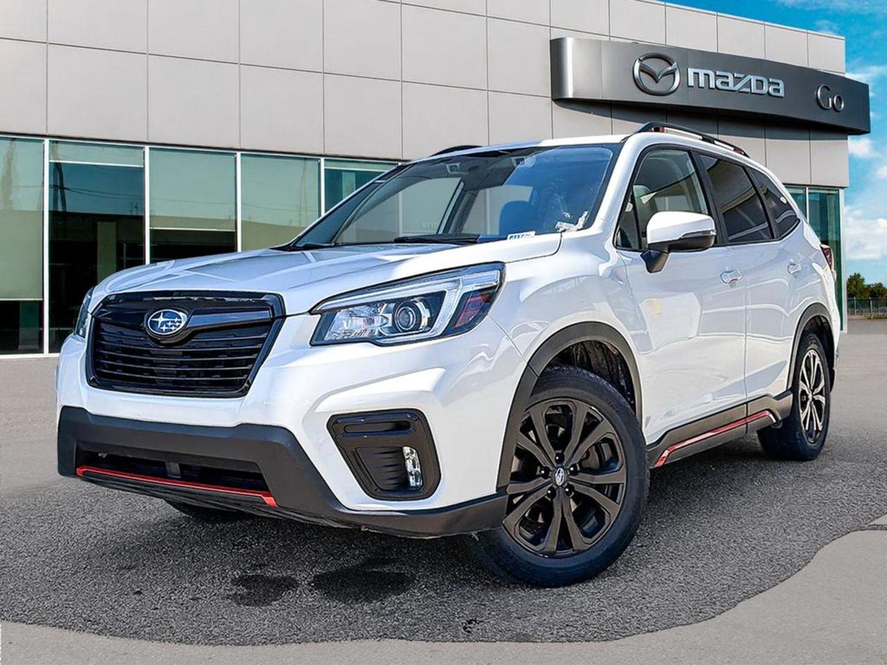 Discover the reliability and versatility of this pre-owned 2019 Subaru Forester Sport 2.5i with the EyeSight Package, finished in sleek White with a comfortable Black interior. Powered by a 2.5L DOHC 4-Cylinder engine and equipped with Subarus renowned full-time AWD and Lineartronic CVT, it offers smooth performance and confident handling in all conditions.Enjoy heated front seats, premium cloth upholstery, and an 8 touchscreen audio system with smart device mirroring for your convenience and entertainment. Safety is front and center with EyeSight Driver Assist Technology, including lane departure prevention, forward collision mitigation, and blind spot warnings.With features like power liftgate, dual-zone climate control, and a spacious interior equipped for 5 passengers, this Forester combines practicality with comfort. Dont miss the chance to own this well-equipped SUV thats perfect for your daily drives and weekend getawayscontact us today to schedule your test drive!Vehicle previously registered in QuebecVehicle has claim on the Carfax report of $9811.21Go Mazda is a AMVIC licenced business