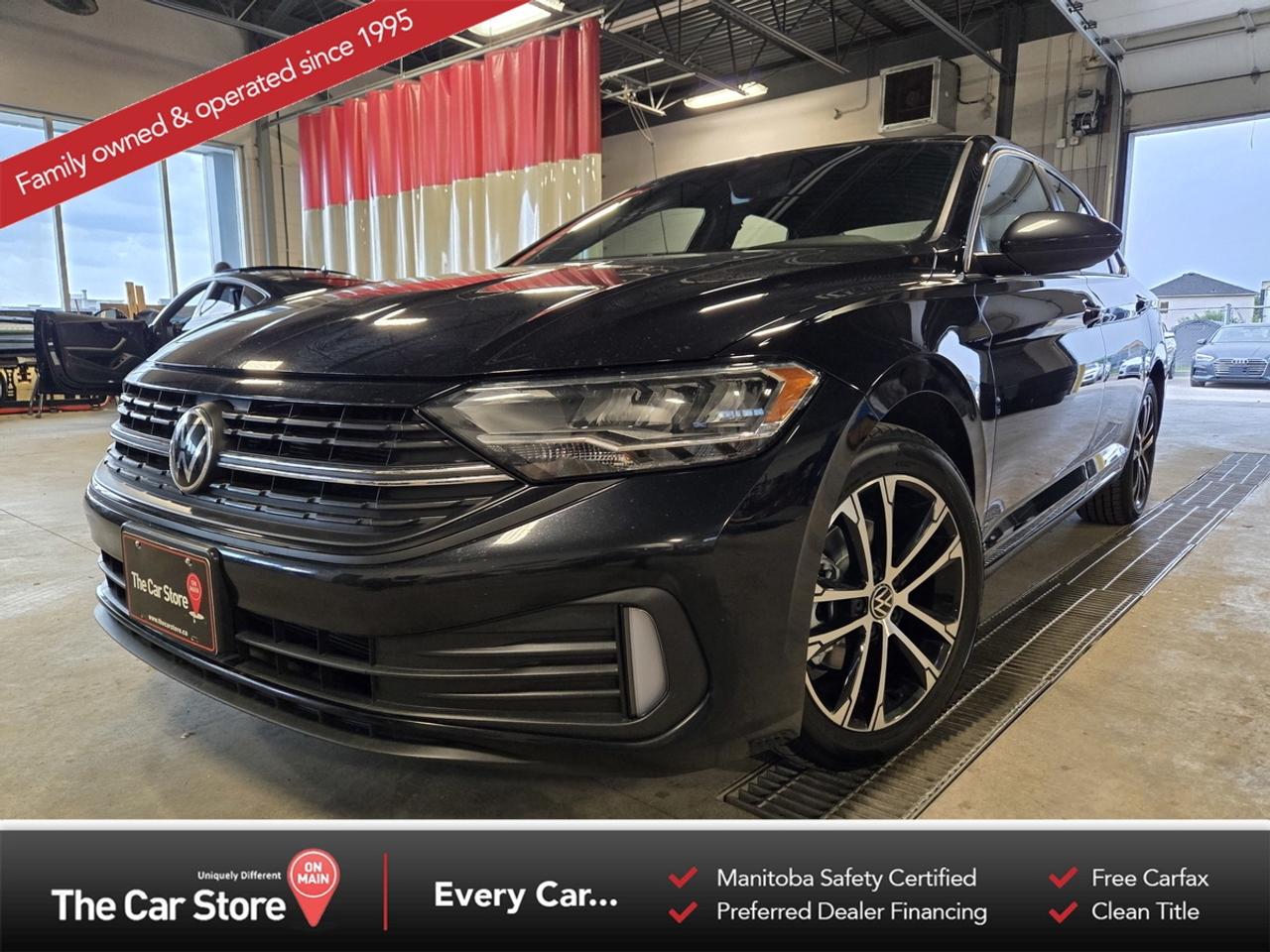 2023 Volkswagen Jetta Comfortline 6-Speed Manual &ndash; One Owner | Sport Package | Factory Warranty Remaining | No Accidents 
 Key Features:1.5L Turbocharged Engine Paired with 6-Speed Manual Transmission 
 One Owner, Local Vehicle 
 No Accidents, Well Maintained 
 Comfortline Trim with Sport Package 
 Virtual Cockpit Digital Display 
 Leather Seating, Power Sunroof 
 Wireless Charging Pad 
 Upgraded Factory Sport Wheels 
 Factory Chrome Delete & Sport Styling Package 
 Customizable Ambient Interior Lighting 
 Heated Front Seats, Heated Steering Wheel 
 Apple CarPlay & Android Auto 
 Blind-Spot Monitoring, Backup Camera 
 Factory Powertrain Warranty Remaining 
 Brand New All-Season Tires 
 Second Set of Winter Tires on Rims Included 
 
 Engaging to Drive and Exceptionally Efficient:The Jetta Comfortline offers impressive fuel economy, a comfortable ride, and a refined interior, while the Sport Package adds a more distinctive appearance and enhanced driving experience. Paired with the 6-speed manual transmission, this example delivers a level of driver engagement that is becoming increasingly difficult to find. 
 
 Peace of mind:A one-owner local vehicle with a clean accident history and strong maintenance record. It also benefits from remaining factory powertrain warranty coverage, brand new all-season tires, and a second set of winter tires mounted on rims. 
 
 Our Take:A well-equipped Jetta with the desirable Sport Package, manual transmission, and excellent ownership history. Efficient, enjoyable to drive, and exceptionally well cared for. 
 
 
 We are a local Family Owned business and we try to do things a little different. 
 
 At The Car Store on Main every vehicle is Manitoba Safety Certified. 
 Every vehicle sold is eligible for the Advantage Plan: 
 30 Day Warranty on all MB Safety certificate related items. 
 CarFax Vehicle History Report 
 2 sets of Keys 
 Wholesale access to all other Miscellaneous Accessories (i.e. Wtr Tires, Remote Starr, all misc vehicle accessories/parts, etc...) 
 And of course a Full tank of Gas. 
 
 There is no Gimmicks or games, we are always aggressive on our prices and try to separate ourselves from the rest. 
 We also have an on-site Certified Banker who shops to get the best possible interest rates in with all Major Banks and Credit Unions! 
 
 Come to our Brand New modern showroom and see what makes us Uniquely Different! 
 
 Located on Main St. just North of Chief Peguis Trail. 
 
 To schedule an appointment call us directly at 204-669-1248 or email sales@thecarstore.ca 
 
 The Car Store on Main 
 -Uniquely Different- 
 
 www.thecarstore.ca 
 Local: 204-669-1248 
 Toll Free: 877-634-2975 
 
 A local family owned business unlike typical car lots, there are no pressure tactics, no games, no gimmicks, no Sales Manager, General Manager or Used Car Manager, just straight answers and fair deals all the time! 
 
 *PRICE DOES NOT INCLUDE TAXES (G.S.T & P.S.T) 
 Dealer Permit # 4481