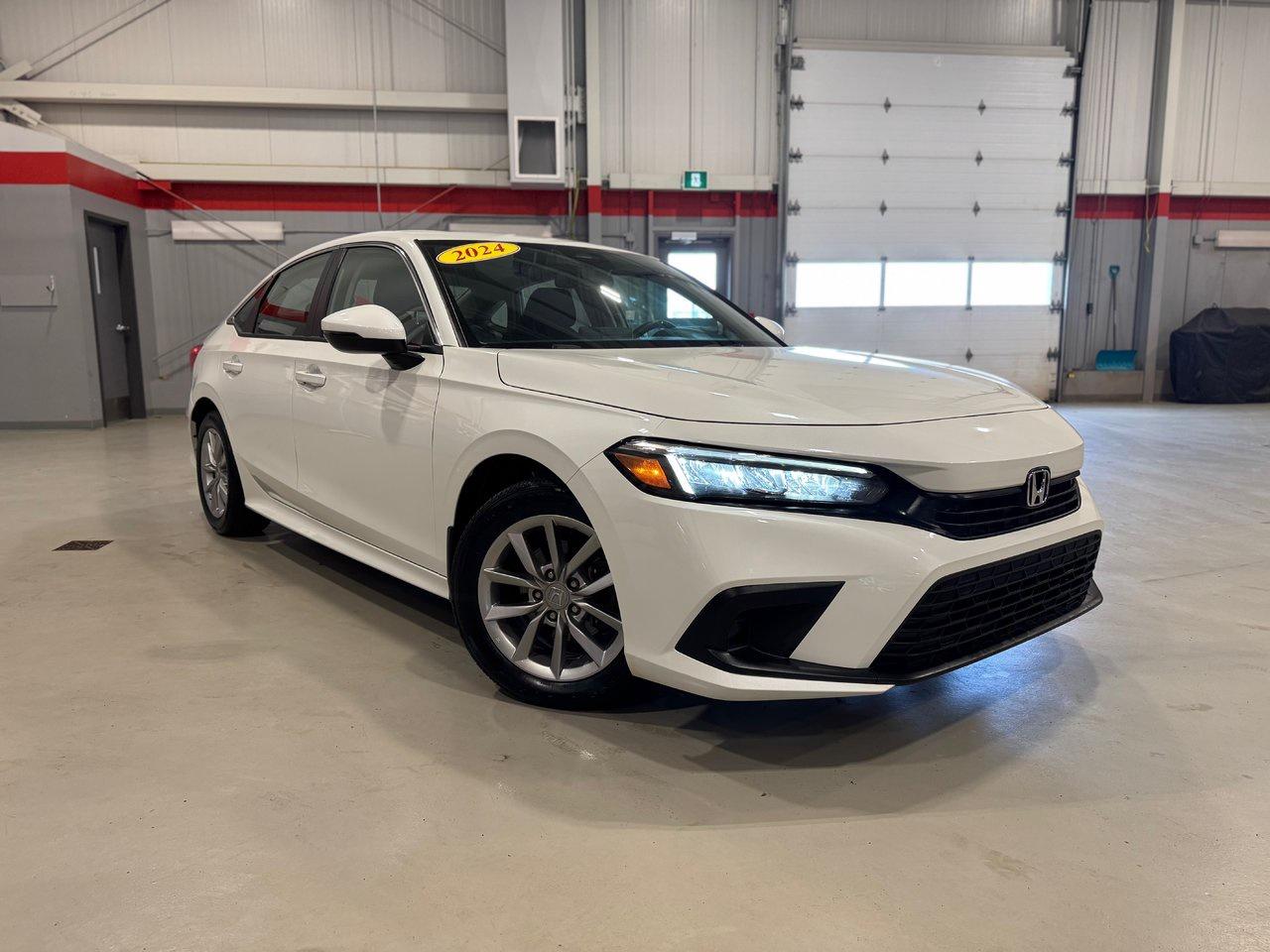 <span>The Honda Civic is part of Canadas automotive heritage. The first Civic arrived in Canada nearly five decades ago. Its been built in Canada for nearly four decades. Its been Canadas best-selling car over the last quarter-century. You cant separate Canadas vehicular landscape from the Honda Civic.</span>




<span>The Civic is a legend, yet this 2024 Honda Civic is also a class-leading, award-winning, critically acclaimed, modern and high-tech sports sedan. This 2024 Honda Civic EX is the heart of the 11th-generation Civic lineup, exemplified by upmarket content like a sunroof, rain-sensing wipers, dual-zone automatic climate control, and proximity access/pushbutton start. There are also heated front seats, a heated steering wheel, &nbsp;auto high beams, blind spot monitoring, and Honda Sensing (adaptive cruise, lane keeping assist, etc.), and a 7-inch centre screen with Apple CarPlay/Android Auto.</span>




<span style=font-weight: 400;>Thank you for your interest in this vehicle. Its located at Centennial Honda, 515 Central Street, Summerside, PEI. We look forward to hearing from you; call us at 1-902-436-9158.</span>