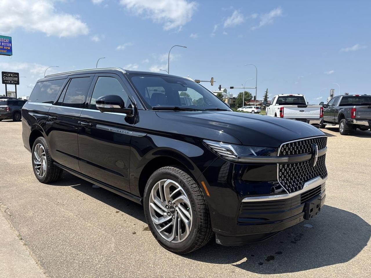 THE PRICE YOU SEE, PLUS GST. GUARANTEED!APPLE CARPLAY/ANDROID AUTO COMPATABLE! 3.5 LITER V6 TWIN TURBOCHARGED ENGINE, 10 SPEED AUTO, RESERVE TRIM(202a), EXTENDED LENGTH, HOT CHOCOLATE PREMIUM LEATHER SEATS, HEATED/VENTED FRONT SEATS, HEATED STEERING WHEEL, PANORAMIC VISTA ROOF, HD TRAILER TOW PKG, LINCOLN CONNECT, REVEL ALTIMA 3D AUDIO SYSTEM, PHONE AS A KEY FEATURE, LINCOLN DIGITAL EXPERIENCE, 2ND ROW CAPTAINS W/ CONSOLE, LINCOLN DRIVE MODES, WIRELESS CHARGING PAD, 22 WHEELS .       The 2025 Lincoln Navigator L with the 3.5-liter engine is a luxurious full-size SUV designed to deliver exceptional comfort, performance, and advanced technology. Powered by a turbocharged 3.5-liter V6 engine, it provides a smooth yet powerful driving experience, with ample torque for effortless towing and highway cruising. The 202a package enhances the vehicle with a range of premium features, including upgraded interior materials, advanced driver-assist systems, and a sophisticated infotainment setup. The Revel Ultima audio system elevates the cabins audio experience, offering rich, immersive sound quality that transforms the interior into a premium concert hall, perfect for entertainment on the go. The HD Tow Package further complements the Navigator Ls capabilities by providing enhanced towing capacity, including an integrated trailer brake controller, upgraded hitch, and additional towing features, allowing it to handle larger trailers, boats, or recreational gear with confidence. Overall, the 2025 Lincoln Navigator L combines luxury, power, and practicality, making it an ideal choice for those seeking a high-end, capable SUV with advanced features and superior comfort.Do you want to know more about this vehicle, CALL, CLICK OR COME ON IN!*AMVIC Licensed Dealer; CarFax and Full Mechanical Inspection Included.