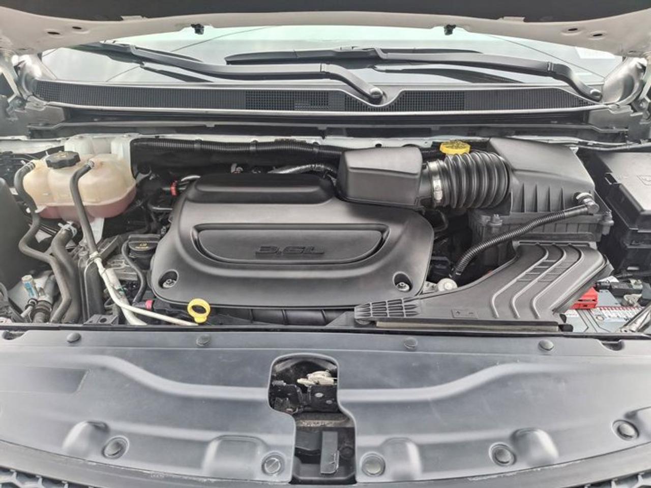 2024 Dodge Grand Caravan SXT | Heated Seats + Steering | Power Sliding Doors | Remote Start | CarPlay | Rear Cam | and More ! Photo
