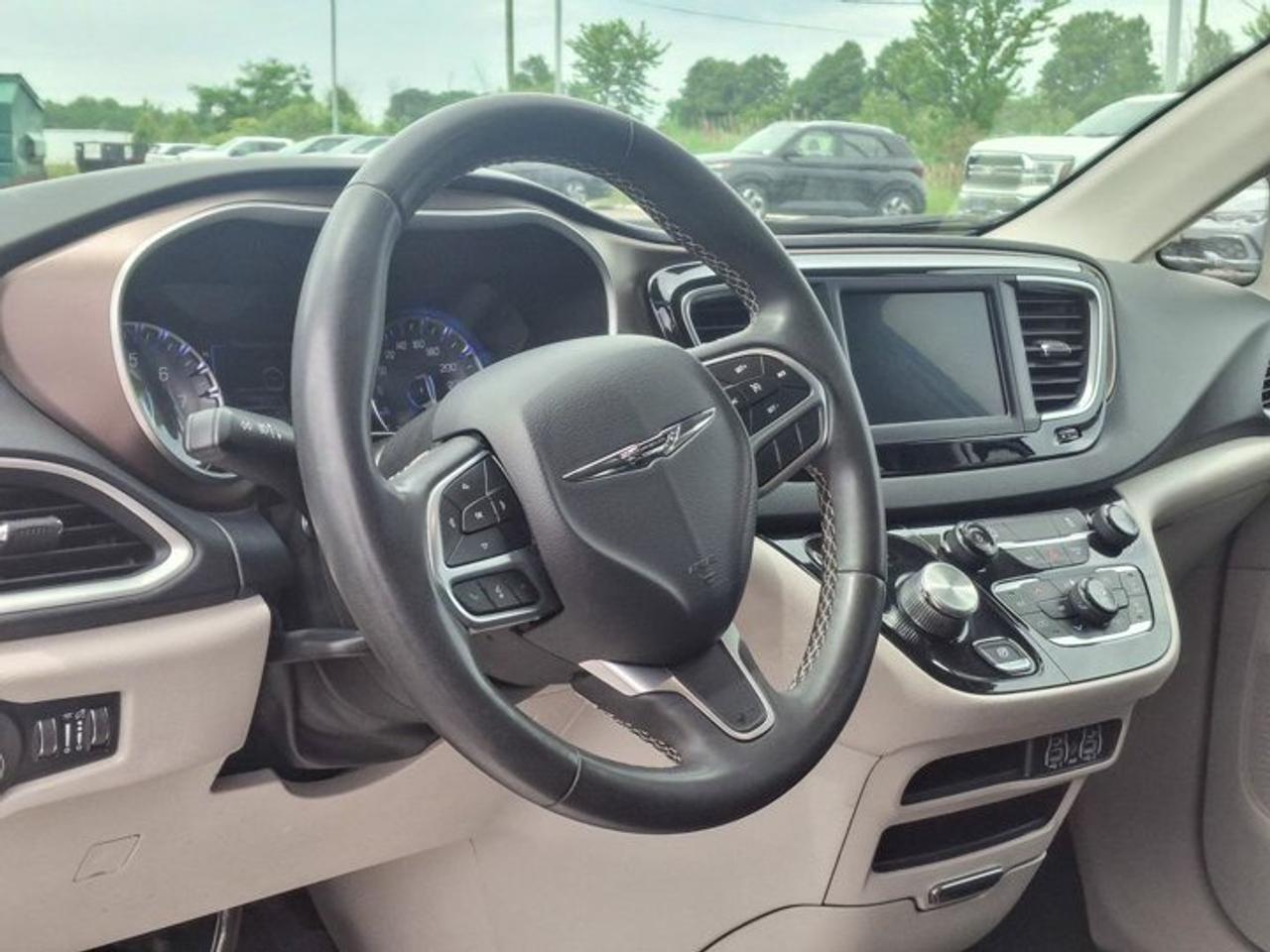 2024 Dodge Grand Caravan SXT | Heated Seats + Steering | Power Sliding Doors | Remote Start | CarPlay | Rear Cam | and More ! Photo
