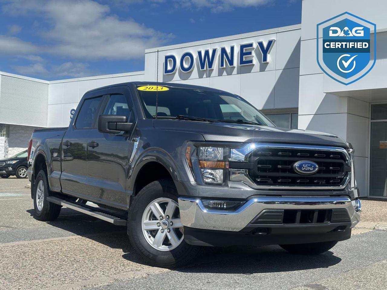 400 horsepower, 500 lb-ft of torque, and the proven 3.5L EcoBoost twin-turbo V6 make this 2023 Ford F-150 XLT SuperCrew a truck that delivers exceptional capability, impressive towing power, and everyday comfort. Whether youre heading to the job site, towing a trailer, or taking the family on a weekend getaway, this F-150 is built to handle it all.

Powered by Fords legendary 3.5L EcoBoost engine, this truck offers outstanding performance with strong low-end torque and excellent towing capability. Paired with Fords smooth-shifting 10-speed automatic transmission and intelligent 4WD system, it provides confident performance in all driving conditions, from city streets and highways to snow-covered roads and off-the-beaten-path adventures.

The SuperCrew configuration provides one of the most spacious cabins in the full-size truck segment, offering generous room for both passengers and cargo. Inside, the XLT trim combines practicality and comfort with premium cloth seating, a power-adjustable drivers seat, remote start, dual-zone climate control, power-adjustable pedals, and a well-designed interior that makes every drive more enjoyable.

Technology is a major highlight of the 2023 F-150. Equipped with Fords SYNC 4 infotainment system, this truck features a large touchscreen display, wireless Apple CarPlay and Android Auto compatibility, Bluetooth connectivity, voice-activated controls, multiple USB ports, and a digital productivity screen that keeps important vehicle information easily accessible. The intuitive interface makes staying connected on the road simple and convenient.

Ford Co-Pilot360 safety technology helps provide added confidence behind the wheel. Features include Pre-Collision Assist with Automatic Emergency Braking, Blind Spot Information System, Rear Cross-Traffic Alert, Lane Keeping System, Rear View Camera, Auto High-Beam Headlamps, and AdvanceTrac with Roll Stability Control. These advanced systems work together to help keep you and your passengers protected on every journey.

The exterior styling continues to set the standard in the truck segment with its bold grille, muscular body lines, alloy wheels, chrome accents, and commanding presence. The versatile 5.5-foot box provides excellent cargo capacity while maintaining easy maneuverability, making this truck equally suited for work and everyday driving.

Combining legendary F-Series capability, powerful EcoBoost performance, advanced technology, and modern comfort, this 2023 Ford F-150 XLT SuperCrew is an excellent choice for anyone looking for a truck that can do it all.

Why buy from Downey Ford? GREAT QUESTION!! Heres why: Market Value Pricing provides the most competitive prices on all our pre-owned vehicles, all the time! Downey Ford is the largest volume Ford dealership in the Maritimes. Every Pre-Owned Vehicle comes with New Wipers, New In-Cabin Filter, and New Engine Air Filter. Plus Plus Plus.

Reconditioning our pre-owned inventory is a source of pride for us! A basic motor vehicle inspection and a quick wash just isnt good enough for our customers. We complete an extremely thorough process, both mechanically and cosmetically, before it meets our standards.

Our mechanical inspection covers 100+++ components including the Engine, Electrical System, Suspension, Transmission, Brakes, Frame, and regular maintenance servicing. Our cosmetic reconditioning is elite and includes Shampooing of Carpet, Acid Wash of Rims, Dressing of Tires, Engine Detail, and a Multi-Stage Polish.

Here are some other extras we are happy to offer at no charge to you: Vehicle History Report, Accident / Damage Report, Stolen Vehicle Report, Lien Search Report, Credit Report Review and Counseling, Free Trade-In Appraisals, Relaxed Low Pressure Sales Experience, Finance Pre-Approval Service, Service Departments covering all of Southern New Brunswick, Delivery Services to all of Canada, Multiple Chartered Bank Financing Sources, Multiple Vehicle Protection Products available, Multiple Loan Protection Products available, and a Pet-Friendly Facility. Feel free to bring Bingo with you.

We want to EARN your business and hope to speak with you soon. Our knowledgeable and friendly sales staff are here to ensure a seamless and enjoyable car-buying experience. Call us at 506-632-6000 to book your test drive today and discover why Downey Ford is the trusted choice for so many.