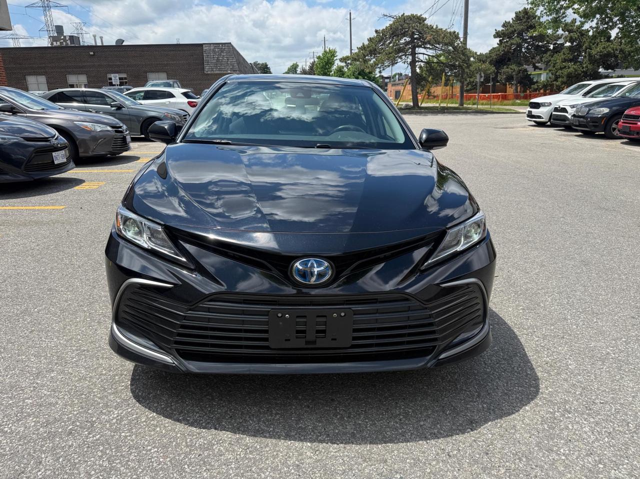 2024 Toyota Camry HYBRID LE Auto Photo