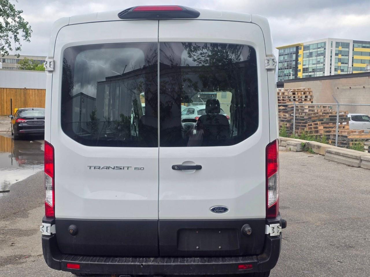 2019 Ford Transit Van T-150 148" Med Rf 8600 GVWR Sliding RH Dr Photo