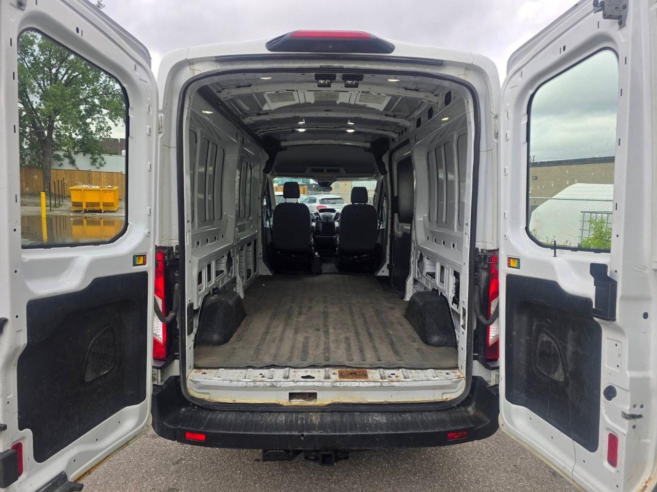 2019 Ford Transit Van T-150 148" Med Rf 8600 GVWR Sliding RH Dr Photo
