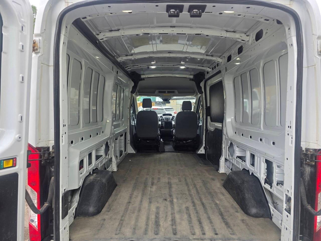 2019 Ford Transit Van T-150 148" Med Rf 8600 GVWR Sliding RH Dr Photo