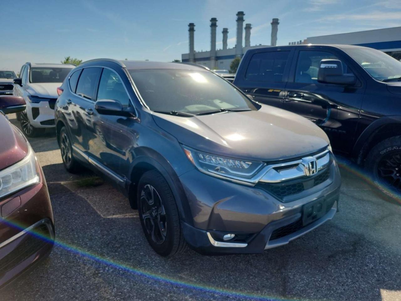 2019 Honda CR-V Touring l AWD l 1.5L l 4Cyl l Gas l Auto l Navi I Photo