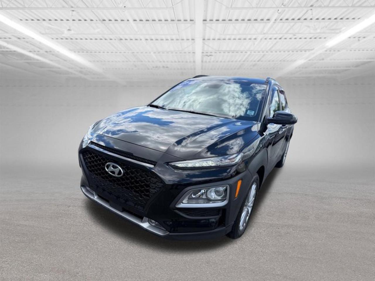 H-PromiseExtensive120 Point Inspection has been completed.FRESH 2 YEAR MVI!Current service and motor vehicle inspection have been completed.A Carfax vehicle history report will be provided.Qualifies for several warranty upgrade options and reduced interest rates.TRADE INS ARE WELCOME.This 2020 Hyundai Kona 2.0L Luxury is a stylish and versatile compact SUV that delivers comfort, capability, and modern technology in one sleek package. With its bold design and confident stance, its perfect for both city driving and weekend adventures.Powered by a reliable and fuel-efficient 2.0L 4-cylinder engine paired with a smooth automatic transmission, this Kona offers a responsive and enjoyable driving experience. Equipped with All-Wheel Drive, it provides added confidence in all road conditions.Inside, the Luxury trim offers a premium cabin loaded with comfort and convenience features, along with high-quality materials and a driver-focused layout.Key features include:Touchscreen infotainment system with Apple CarPlay & Android AutoNavigation systemLeather seats with heated front seatsHeated steering wheelPower sunroofDual-zone automatic climate controlBackup camera & blind spot monitoringLane keep assist & forward collision avoidancePush-button start with proximity keyPower drivers seatAlloy wheelsHyundais advanced safety features provide peace of mind, making this Kona a great choice for daily commuting or family use.With its combination of sporty styling, advanced features, and all-weather capability, this 2020 Hyundai Kona Luxury is an outstanding compact SUV offering excellent value.