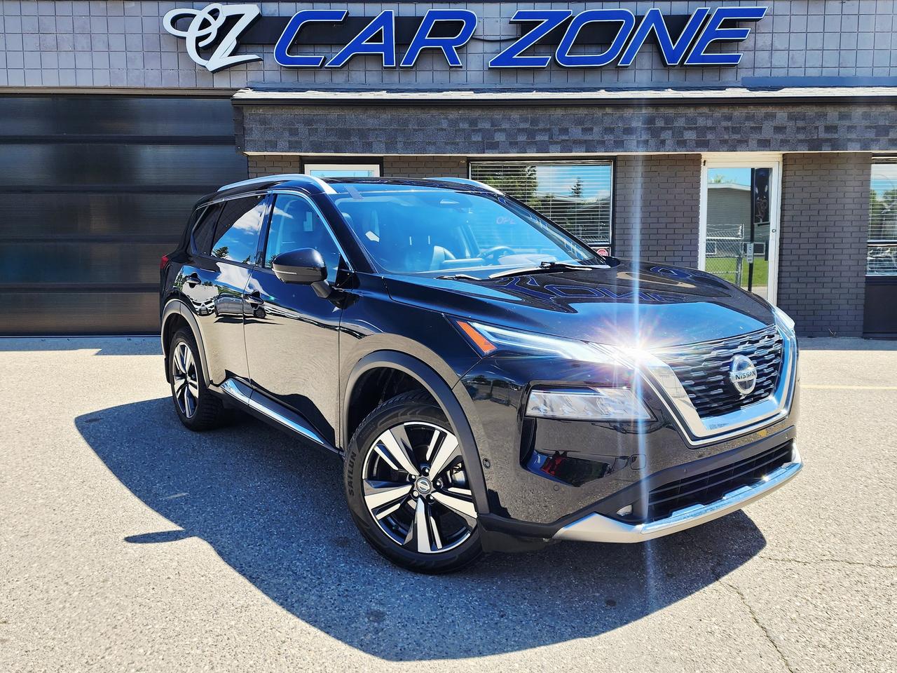 <p>Looking for a sophisticated and capable SUV thats ready for any adventure? Car Zone is thrilled to present this exceptional <strong>2021 Nissan Rogue Platinum</strong>, a vehicle designed to elevate your driving experience. Dressed in a sleek, timeless black exterior thats perfectly complemented by a luxurious black interior, this Rogue exudes modern style and premium comfort. Underneath its captivating facade lies a robust 2.5L I4 engine paired with a smooth Variable Transmission and an intelligent All-Wheel Drive system, ensuring confident performance and remarkable efficiency whether youre navigating city streets or tackling Canadian highways.</p><p>This Rogue Platinum has been well-traveled and is eager for many more miles of exploration. As the top-tier Platinum trim, its packed with advanced technology and comfort features that make every drive a pleasure. From its spacious and versatile SUV/Crossover body style to its practical 4-door configuration, this Nissan Rogue Platinum is the perfect blend of practicality and refinement for discerning drivers.</p><p>Here are five of the most sizzling features youll love:</p><ul><li><strong>Platinum Trim Luxury:</strong> Experience the pinnacle of Rogue comfort and convenience with premium finishes and upscale materials throughout the cabin, making every journey feel first-class.</li><li><strong>Intelligent All-Wheel Drive:</strong> Conquer Canadian weather with confidence. This advanced AWD system provides superior traction and stability on snow, ice, and wet roads, keeping you in control no matter the conditions.</li><li><strong>Advanced Driver Assistance Systems:</strong> Enjoy peace of mind with a suite of cutting-edge safety features designed to protect you and your passengers, offering an extra layer of security on every drive.</li><li><strong>Premium Infotainment Experience:</strong> Stay connected and entertained with the Rogues intuitive infotainment system, featuring seamless smartphone integration and crystal-clear audio for an enjoyable journey.</li><li><strong>Spacious and Versatile Interior:</strong> Whether its a weekend getaway or your daily commute, the generous cargo space and comfortable seating ensure everyone and everything travels in style and with ample room.</li></ul><p>Looking for Your Dream Car? Call Car Zone Today!</p><p>Thanks for viewing our Car Zone inventory. All of our vehicles come fully detailed with a Carfax and a mechanical fitness assessment. Drive this home today! Easy financing options. All credit welcome.&nbsp;<strong><a href=http://www.calgary.ca/finance>APPLY NOW</a>&nbsp;</strong>We even take trades. Same day approvals at&nbsp;<a href=http://www.carzonecalgary.ca/><strong>CARZONECALGARY</strong></a> or visit us in person at 2036 36 Street SE Calgary for a hassle free test drive. Let our friendly team of experts book an appointment with you and show you the Car Zone difference! AMVIC licensed dealer.&nbsp;</p>